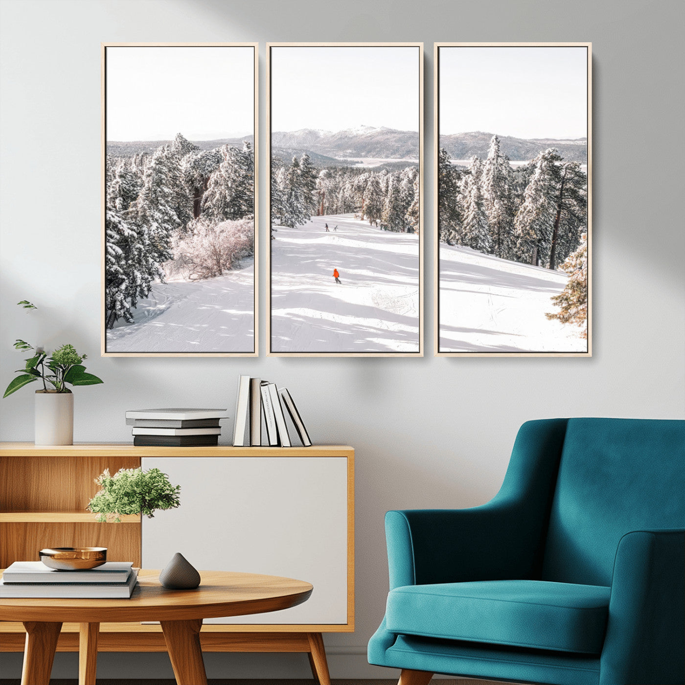Bright ski trail lined with snow-covered pines and a skier in orange, perfect for alpine adventure or winter sports-inspired decor.