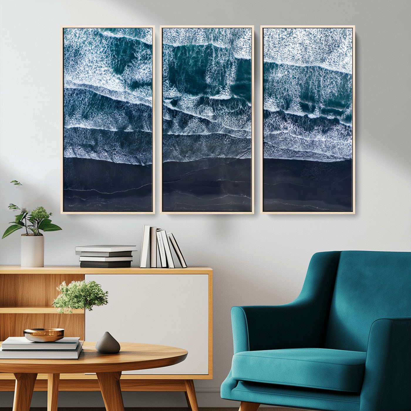 Canvas of aerial ocean waves crashing onto a black sand beach in moody tones, ideal for modern coastal or minimalist home decor.