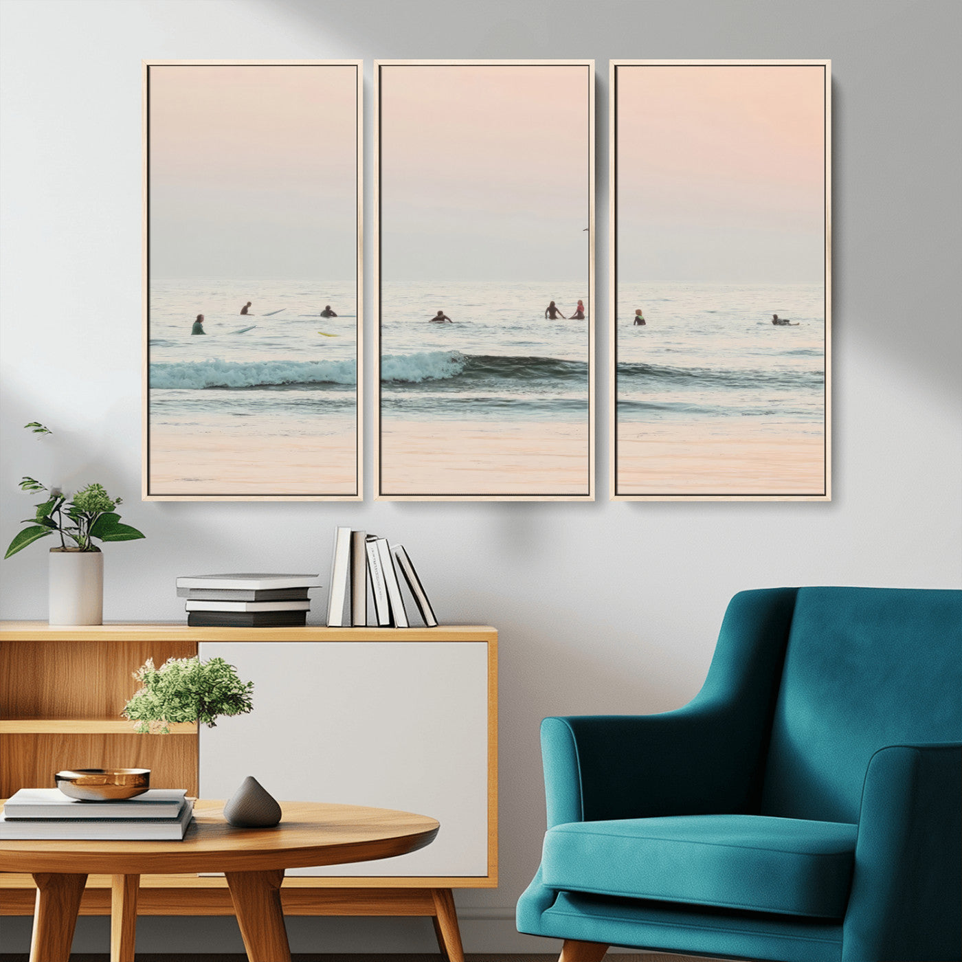 Dreamy photo of surfers waiting on soft pastel waves under a pink sunset sky, ideal for soft coastal minimalist or serene ocean-themed home decor.