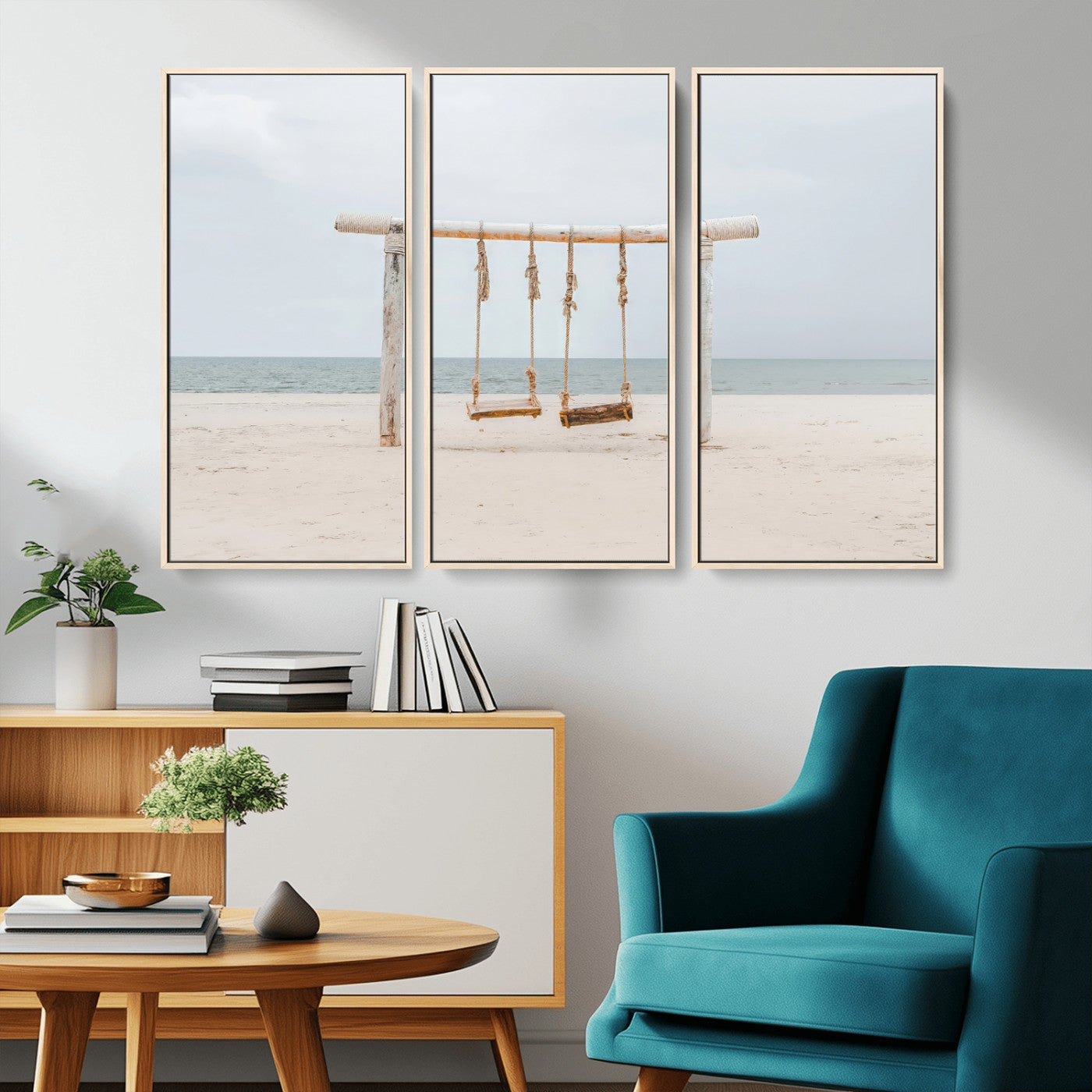 A rustic wooden beach swing stands on a serene sandy shore with an ocean horizon in the background, creating a tranquil and dreamy coastal escape.
