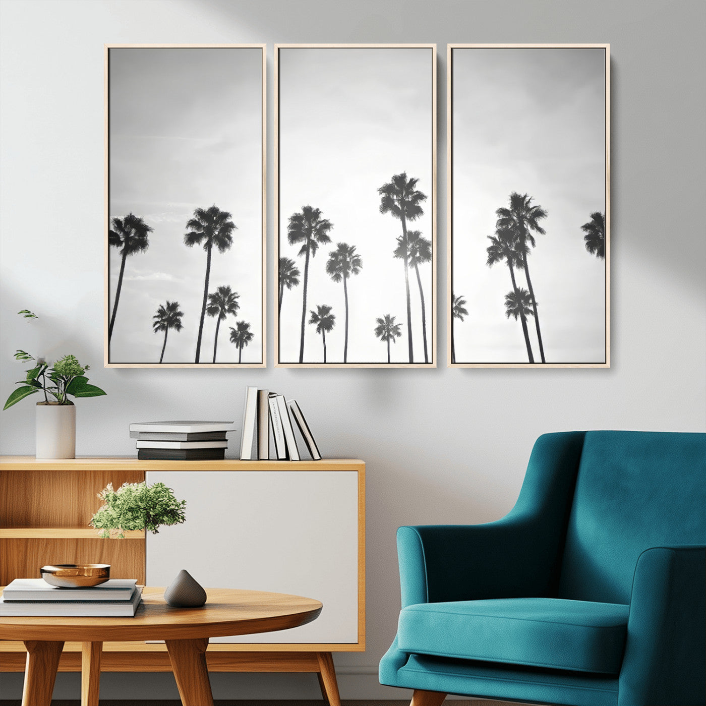 A black and white minimalist scene featuring tall palm trees silhouetted against a bright sky, creating a dreamy and timeless tropical aesthetic.