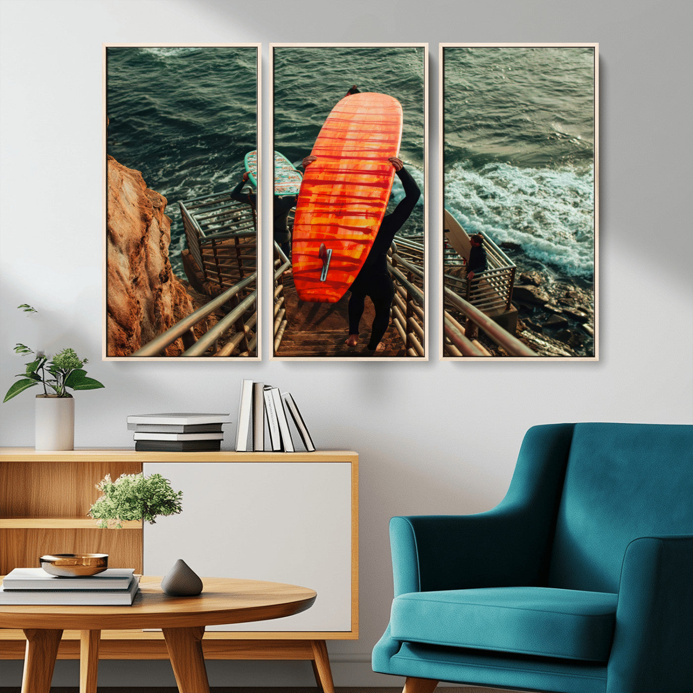 A surfer carrying a bold orange surfboard down a rugged staircase toward the ocean, bathed in golden hour light, capturing the energy of coastal adventure.