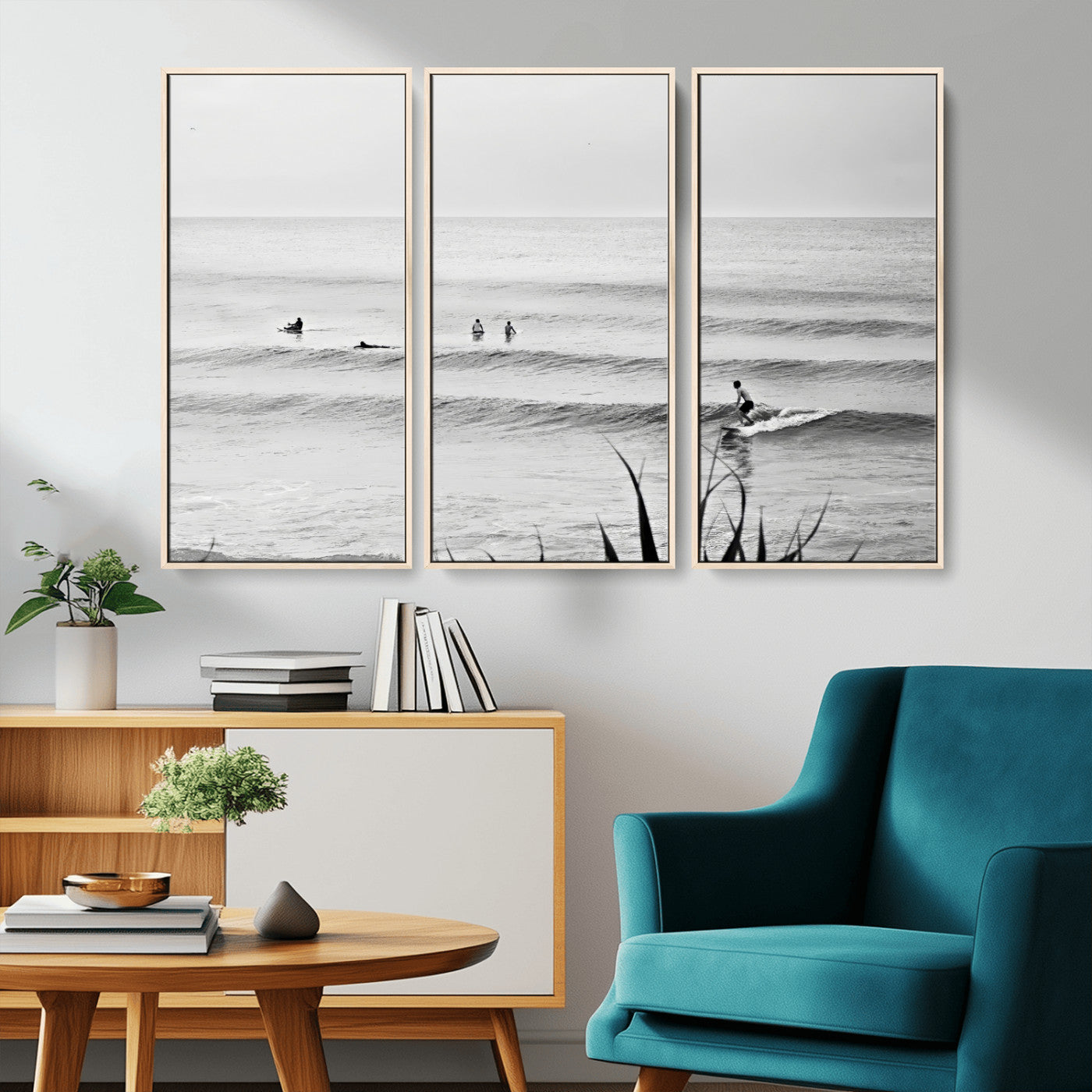 Monochrome canvas of surfers on calm ocean waves, ideal for minimalist coastal or beach-inspired interior decor.