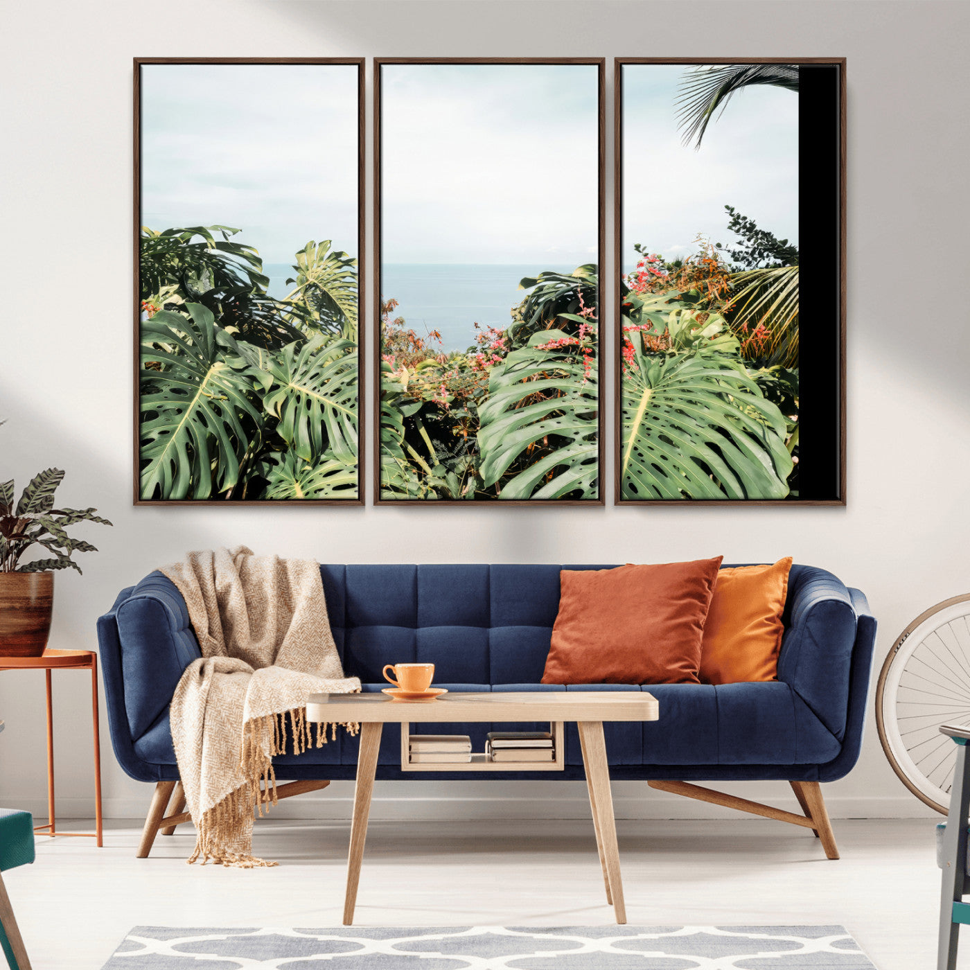 Monstera leaves and tropical flowers framing a calm ocean view, ideal for tropical coastal or exotic jungle-style interior wall decor.