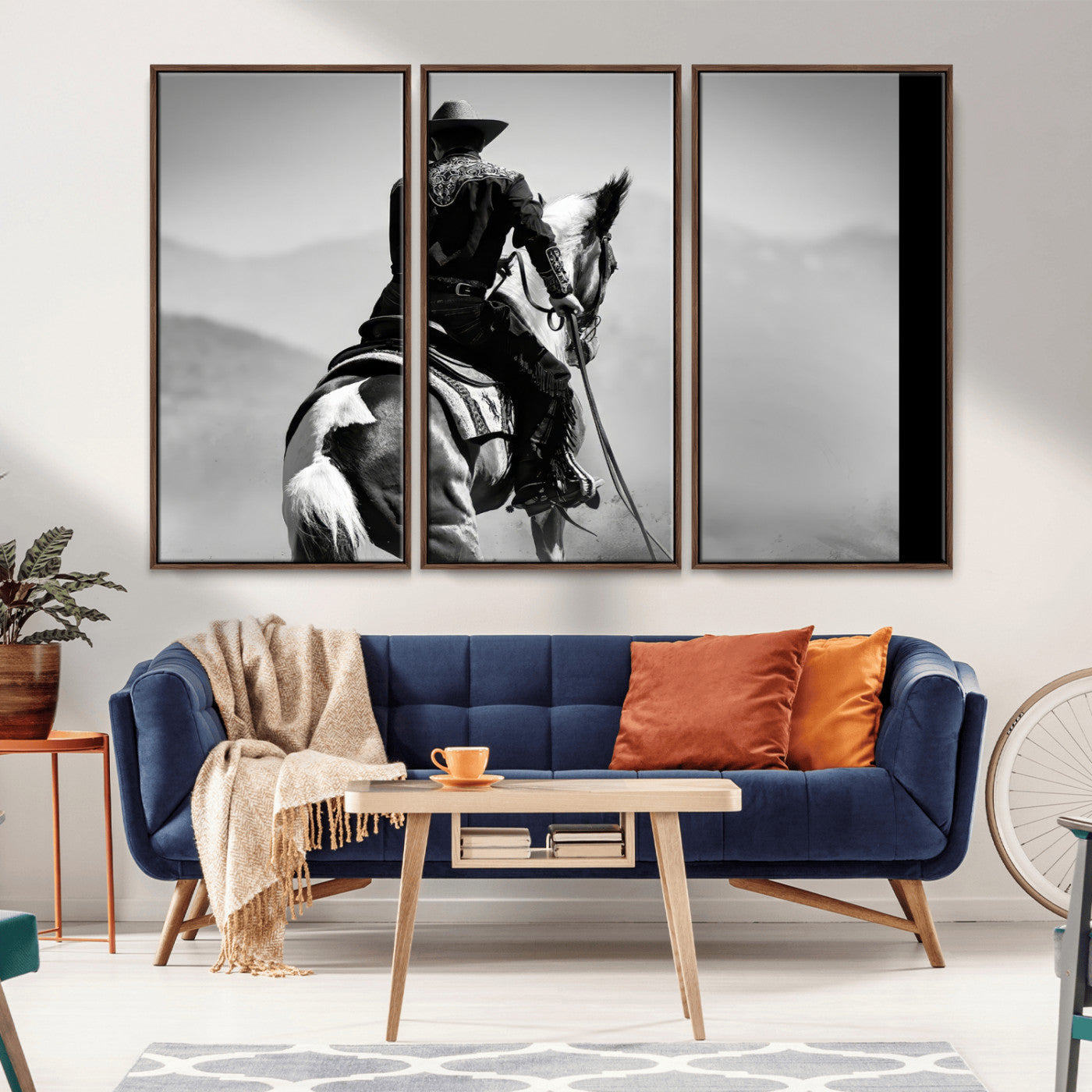 Black and white canvas of a cowboy on horseback with moody tones, perfect for rustic western or country-inspired home decor.