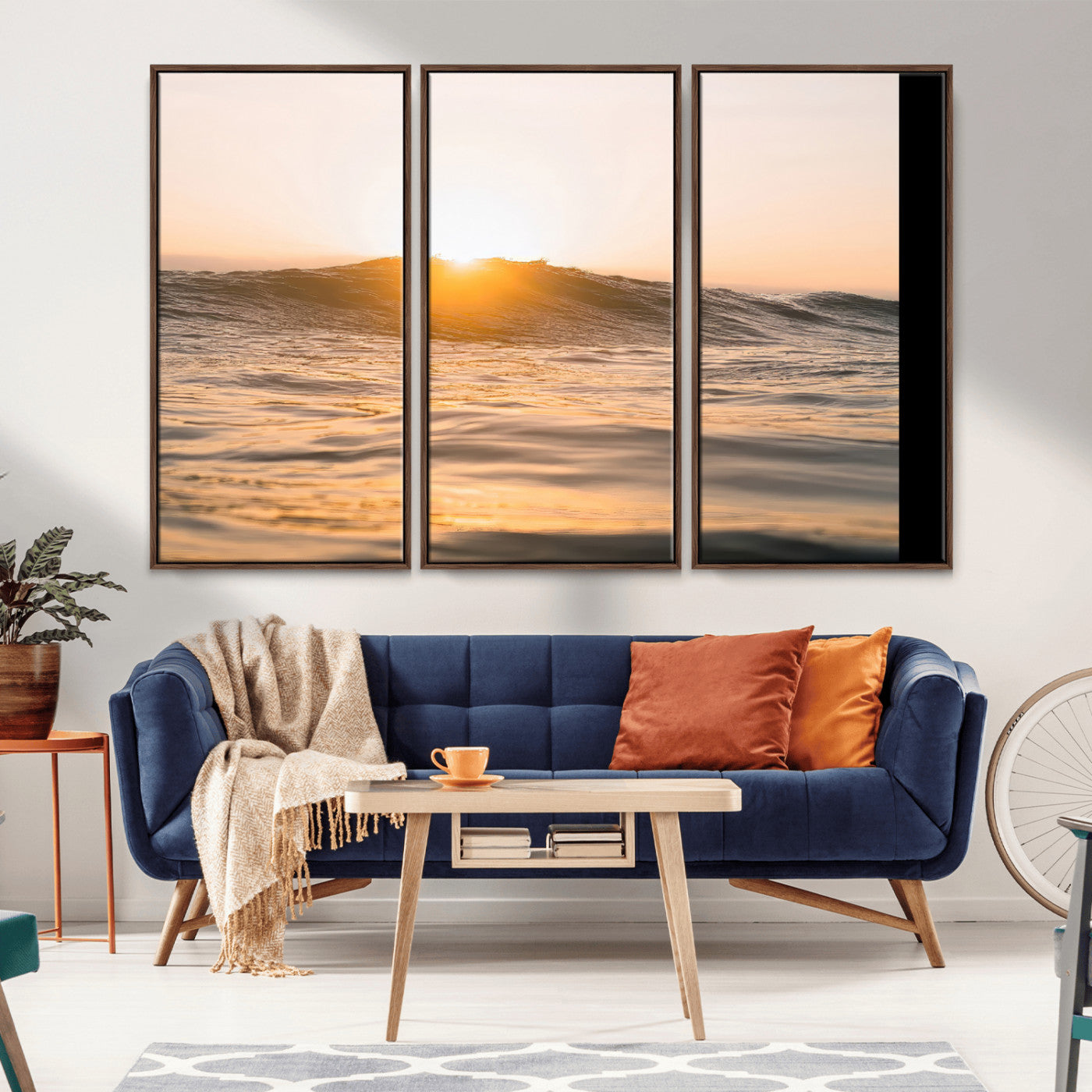 Ocean waves glowing under a warm golden sunset, reflecting soft light and calm movement, perfect for warm minimalist coastal interiors.