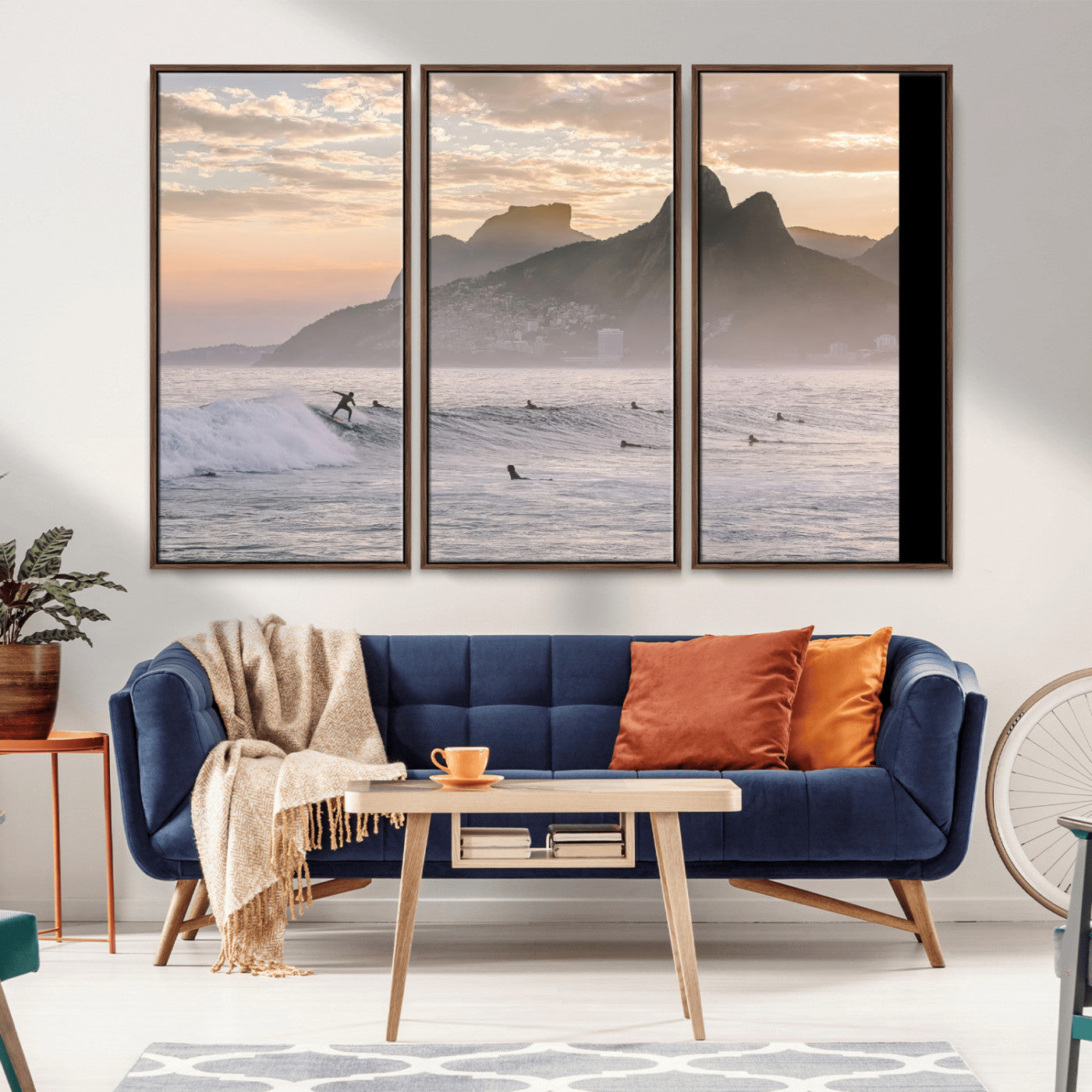 A surfer rides a golden hour wave near misty coastal mountains, surrounded by fellow surfers, capturing the spirit of a coastal adventure.