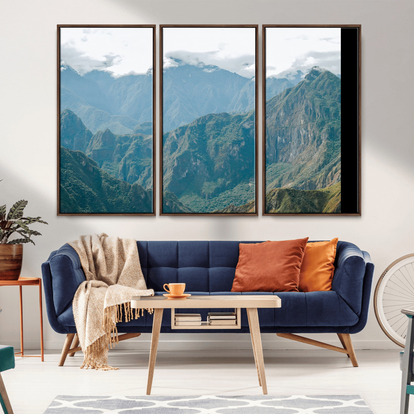A misty mountain landscape with cloud-covered Andean peaks and lush green valleys, creating a dramatic and serene view, perfect for rustic or nature-inspired home decor.