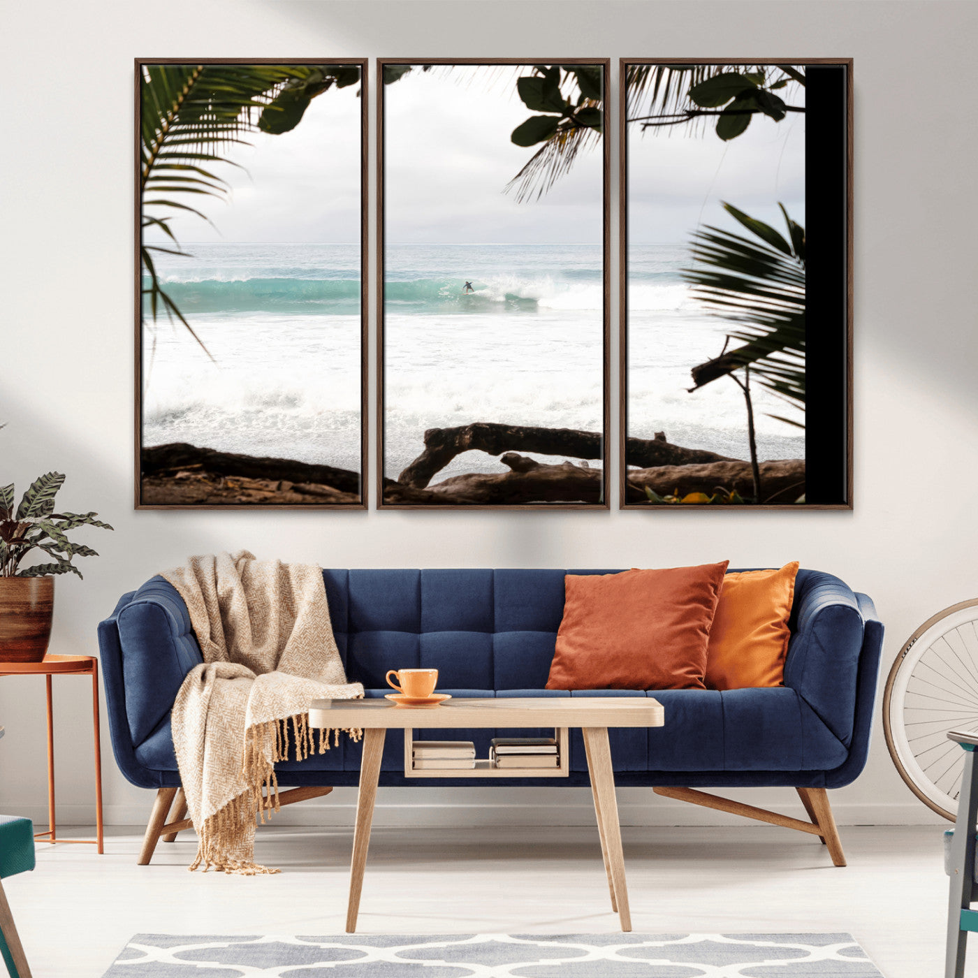 Tropical beach view with palm trees and surfer riding a wave, perfect for boho or coastal-inspired interior wall decor.