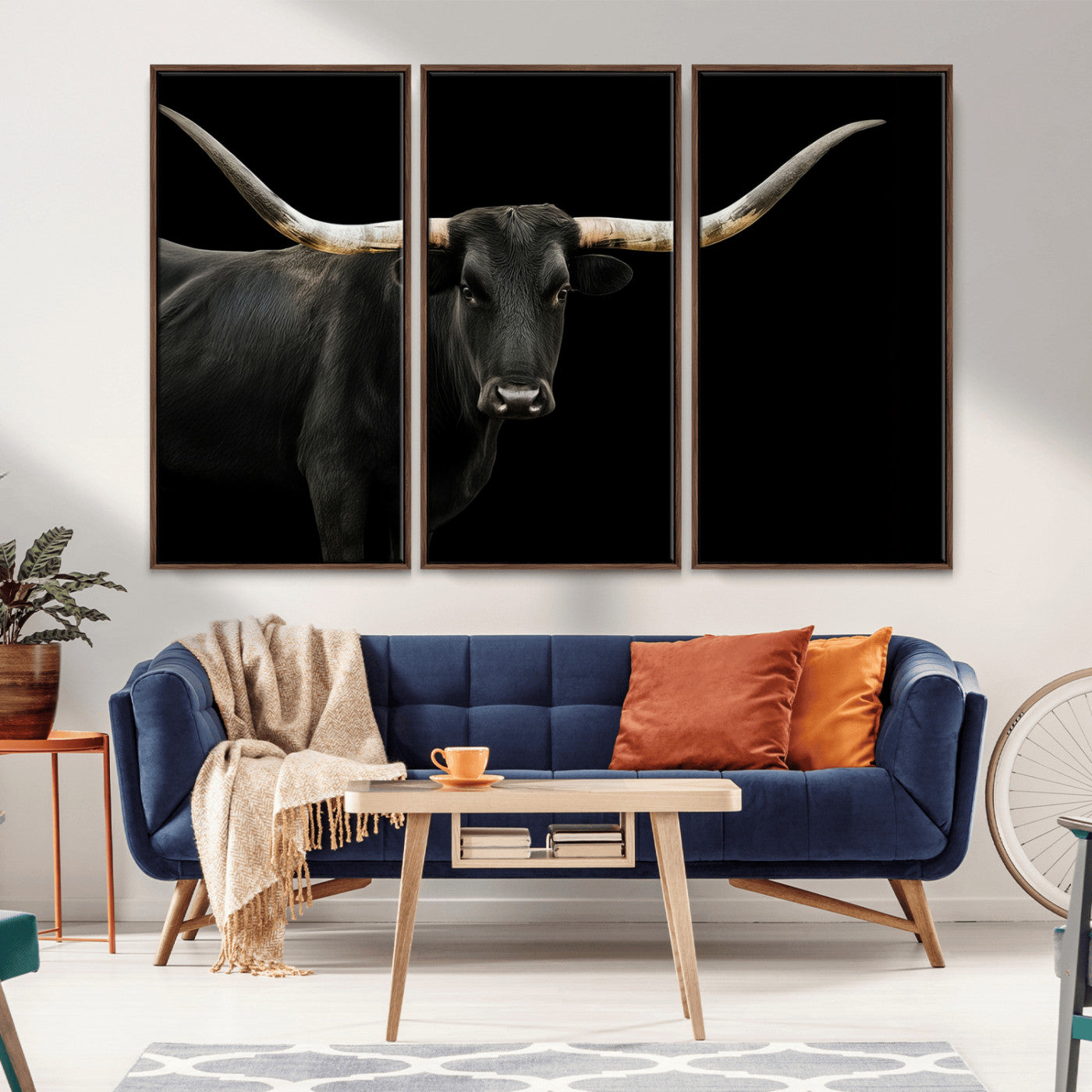 Close-up of a black Texas longhorn with large curved horns on black background, ideal for rustic farmhouse or modern western interiors.