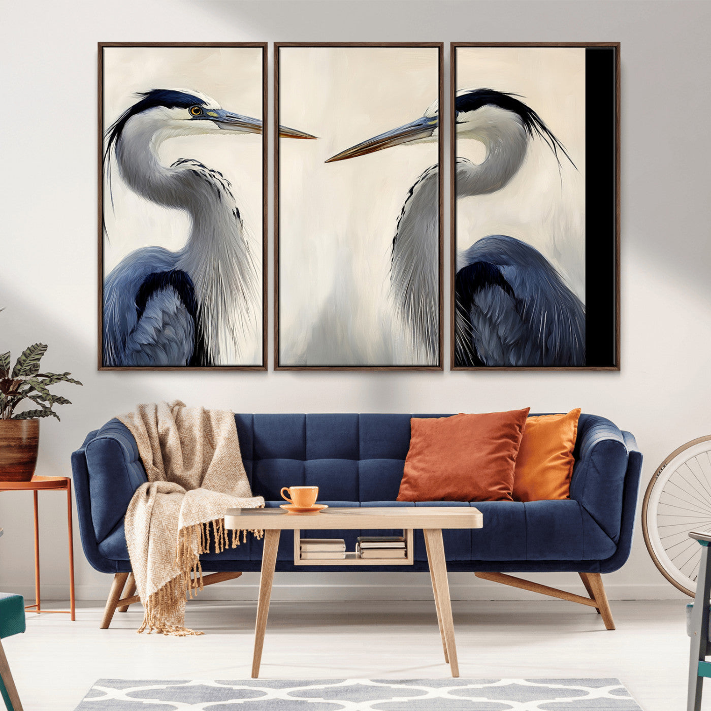 Two blue herons facing each other on a soft neutral background, ideal for coastal, tranquil, or nature-inspired minimalist interiors.