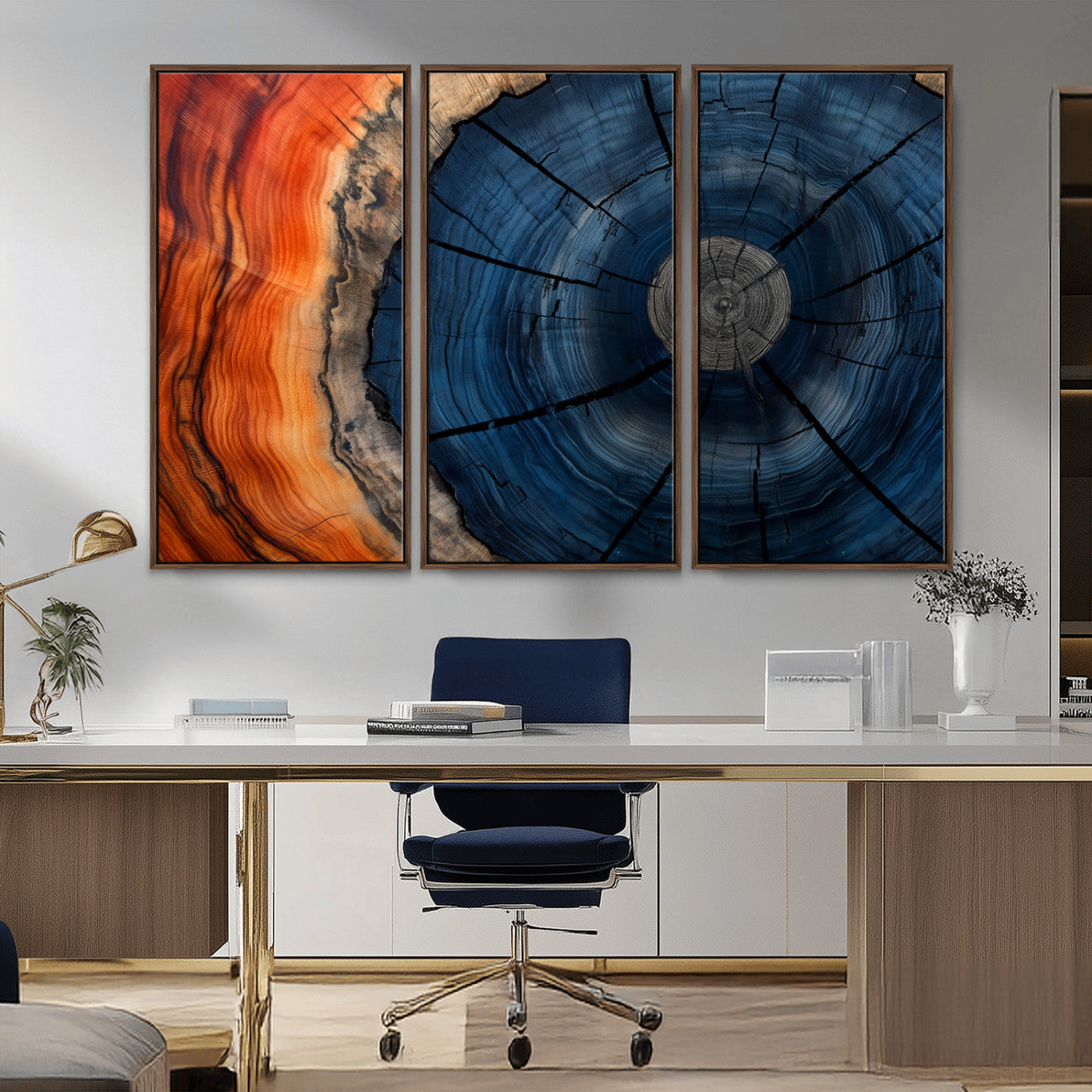 A captivating close-up of a tree trunk, showcasing its concentric rings in rich shades of blue, orange, and brown, highlighting the organic patterns of natural wood.