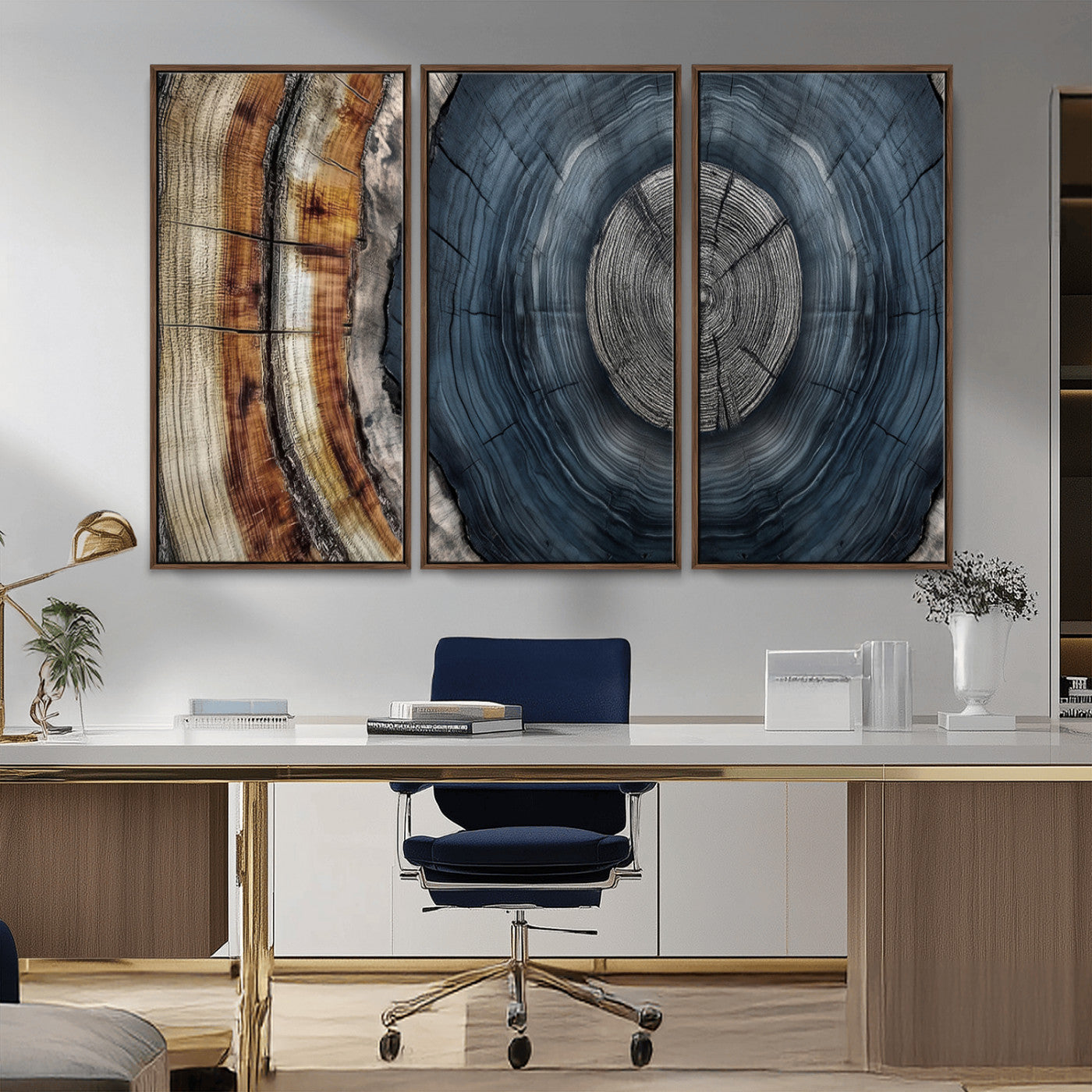 A stunning close-up of a tree trunk showing the intricate, circular growth rings, showcasing the natural textures and rich contrasts in deep blues, browns, and silvers.