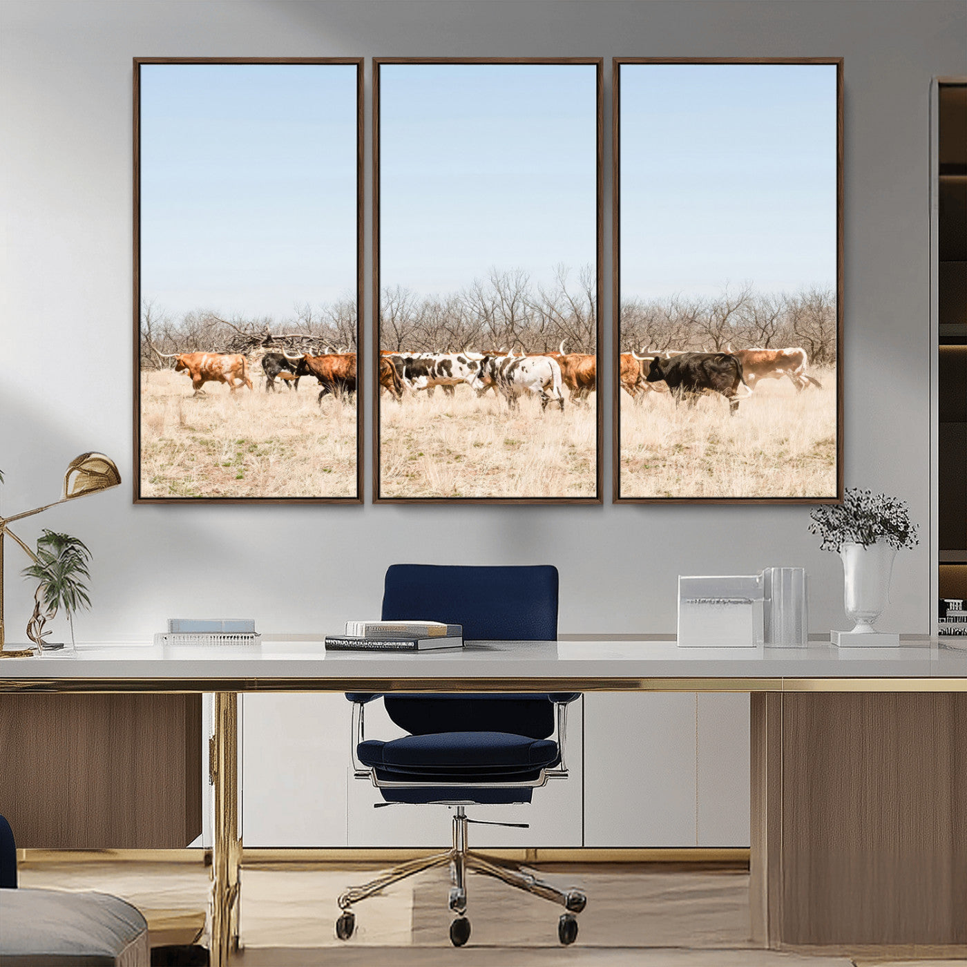Framed wall art of Texas longhorn cattle walking through a dry, neutral-toned prairie, perfect for rustic farmhouse or western-themed home decor.