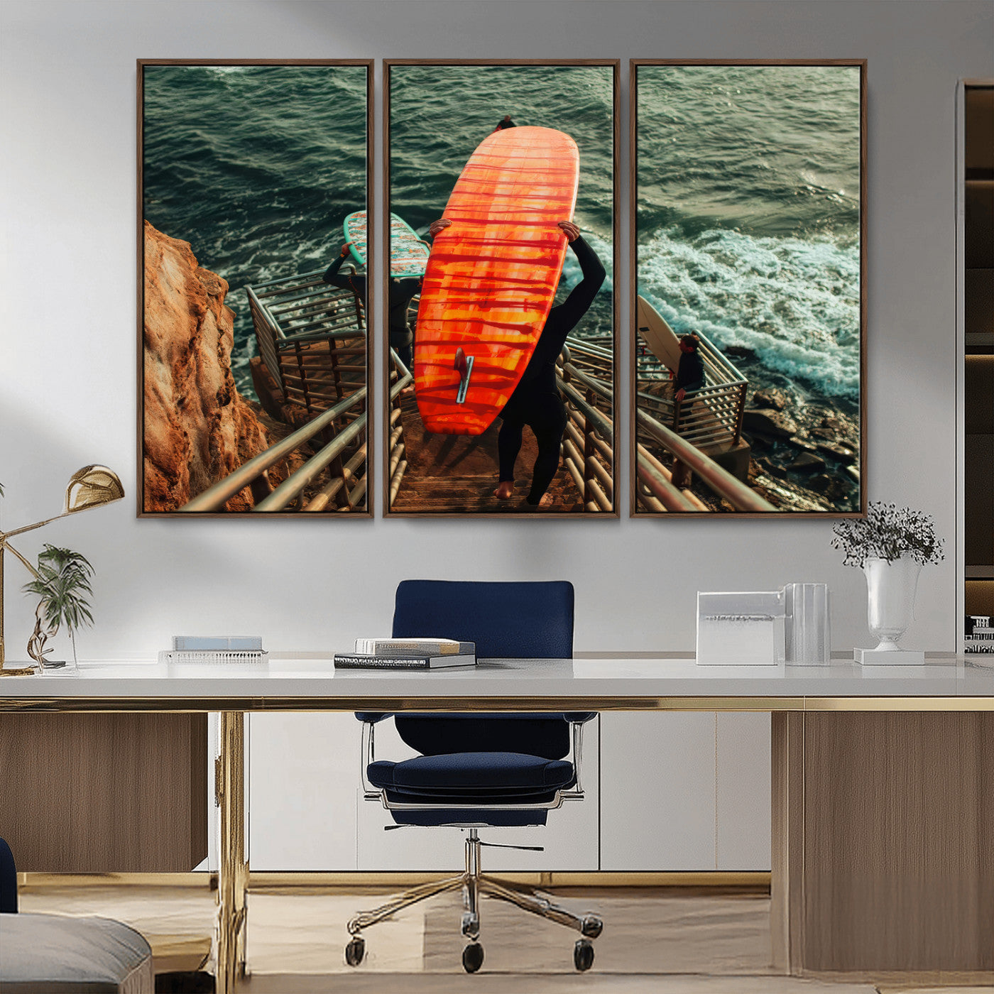 A surfer carrying a bold orange surfboard down a rugged staircase toward the ocean, bathed in golden hour light, capturing the energy of coastal adventure.