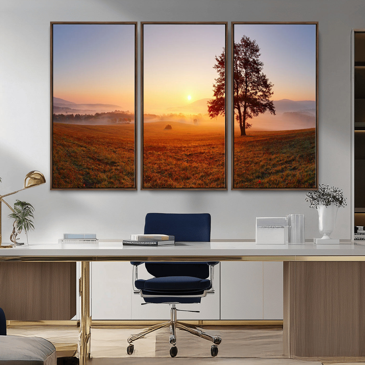 A tranquil landscape at sunrise with a mist-covered field and a lone tree, creating a peaceful and natural atmosphere.