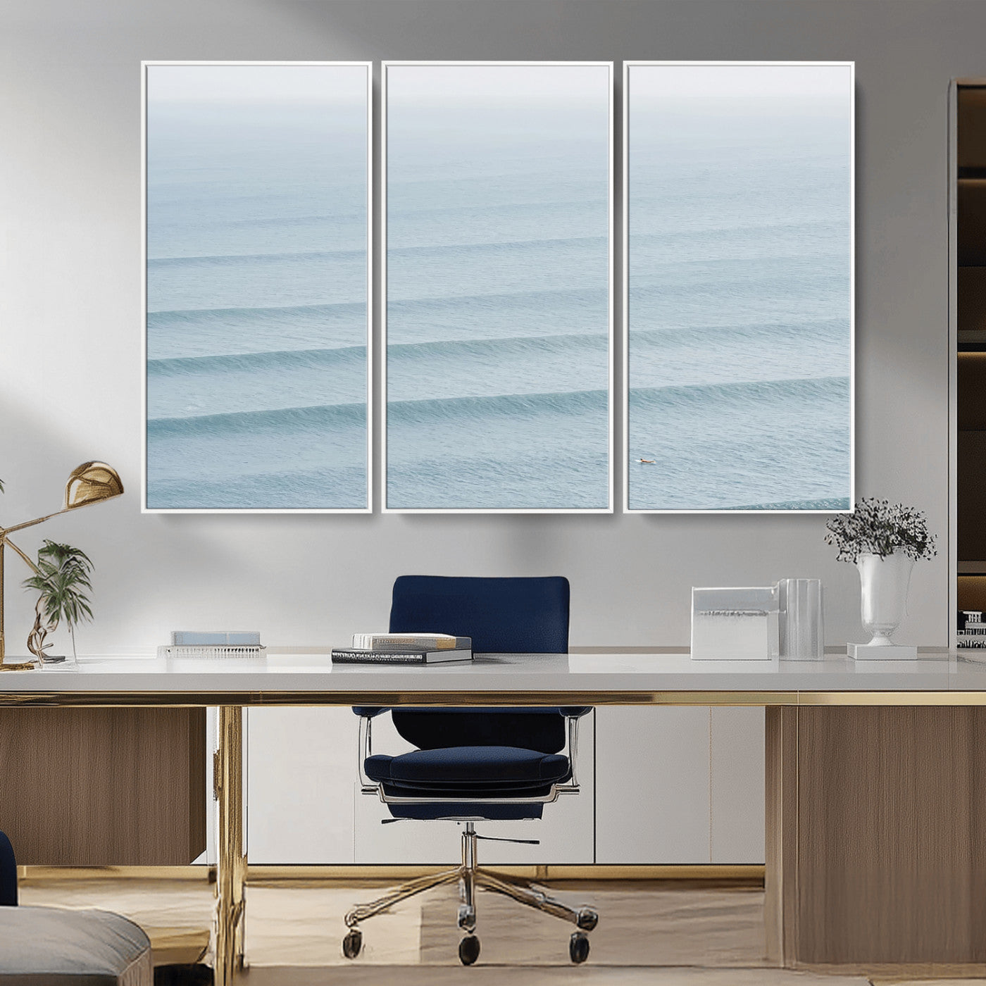 Framed canvas of repeating ocean waves with a distant solo surfer, ideal for minimalist ocean or calm coastal wall decor.