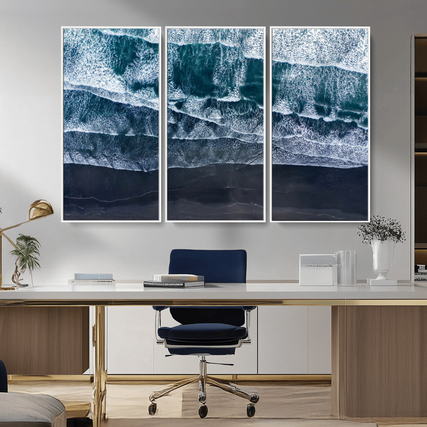 Canvas of aerial ocean waves crashing onto a black sand beach in moody tones, ideal for modern coastal or minimalist home decor.