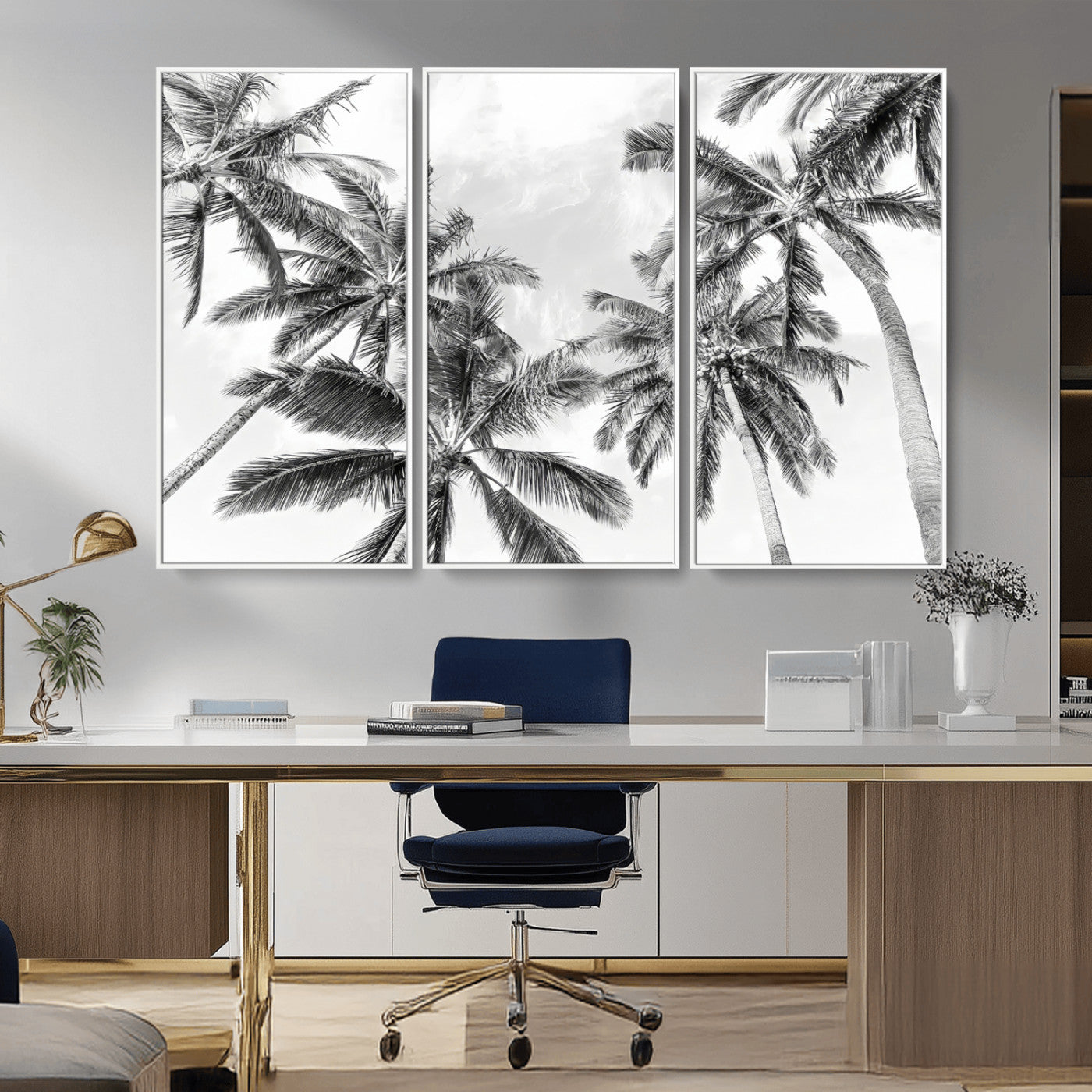Black and white tropical palm trees viewed from below, swaying gently against a bright sky, creating a serene and elegant coastal atmosphere.