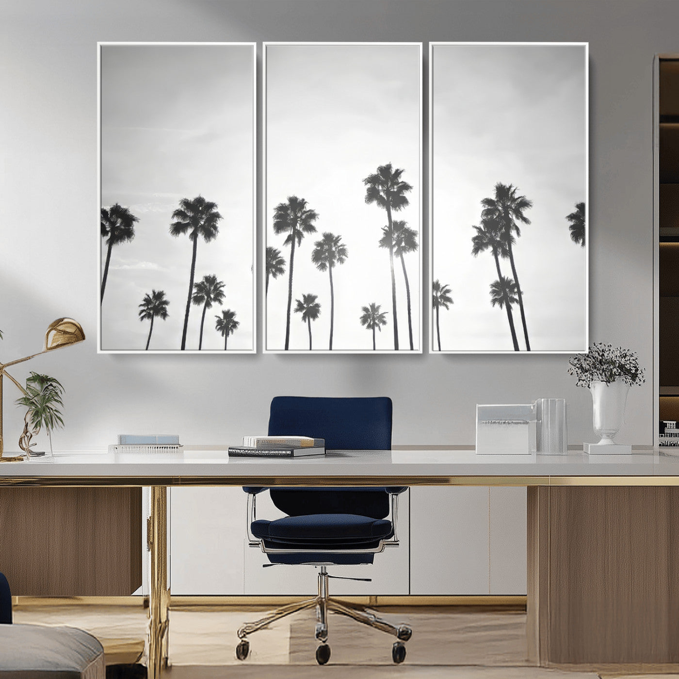 A black and white minimalist scene featuring tall palm trees silhouetted against a bright sky, creating a dreamy and timeless tropical aesthetic.