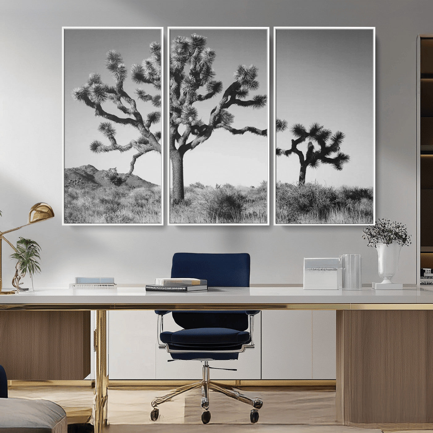 Black and white Joshua trees in a rugged desert landscape, creating a calm and minimalist feel for natural or rustic-themed interiors.