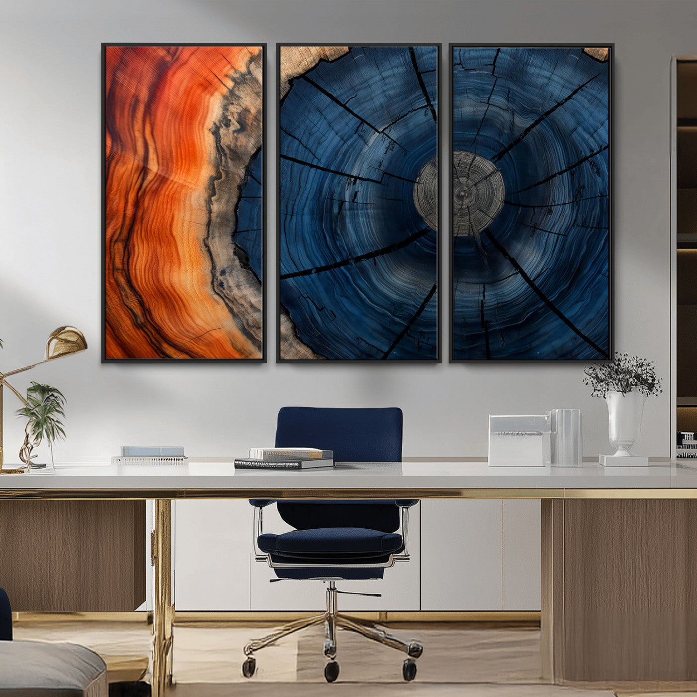 A captivating close-up of a tree trunk, showcasing its concentric rings in rich shades of blue, orange, and brown, highlighting the organic patterns of natural wood.