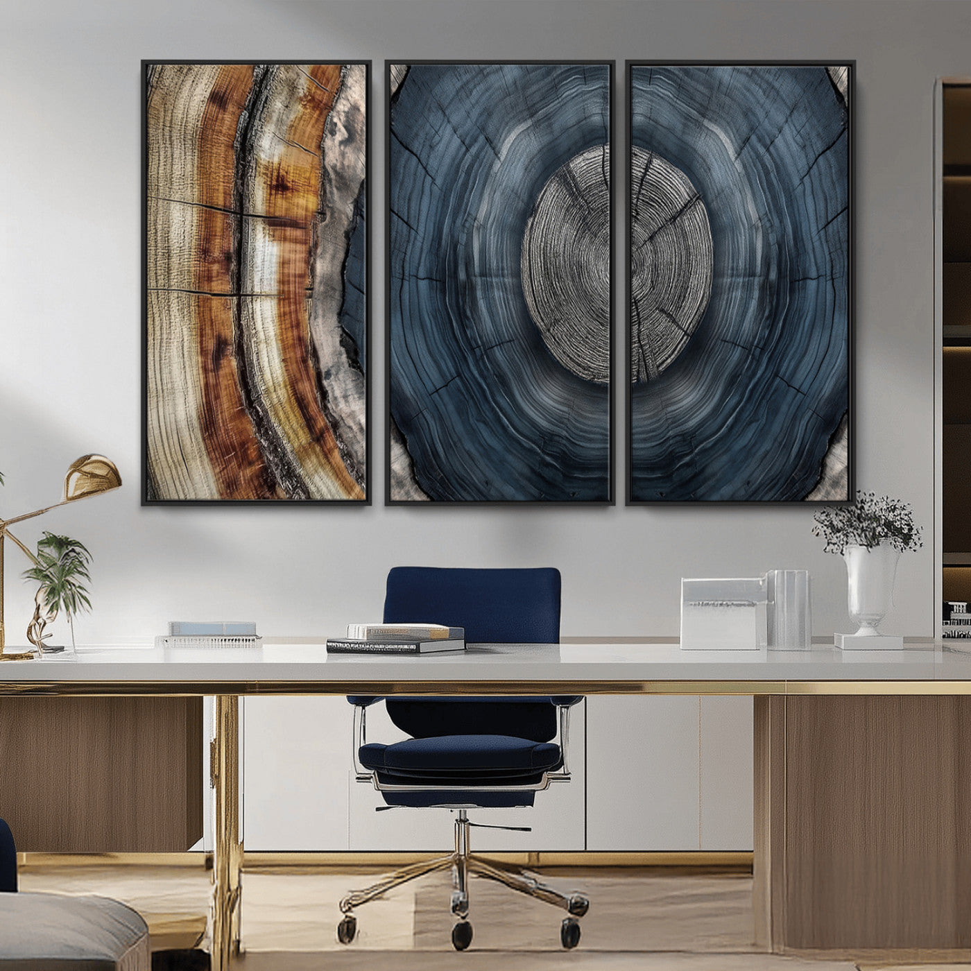A stunning close-up of a tree trunk showing the intricate, circular growth rings, showcasing the natural textures and rich contrasts in deep blues, browns, and silvers.