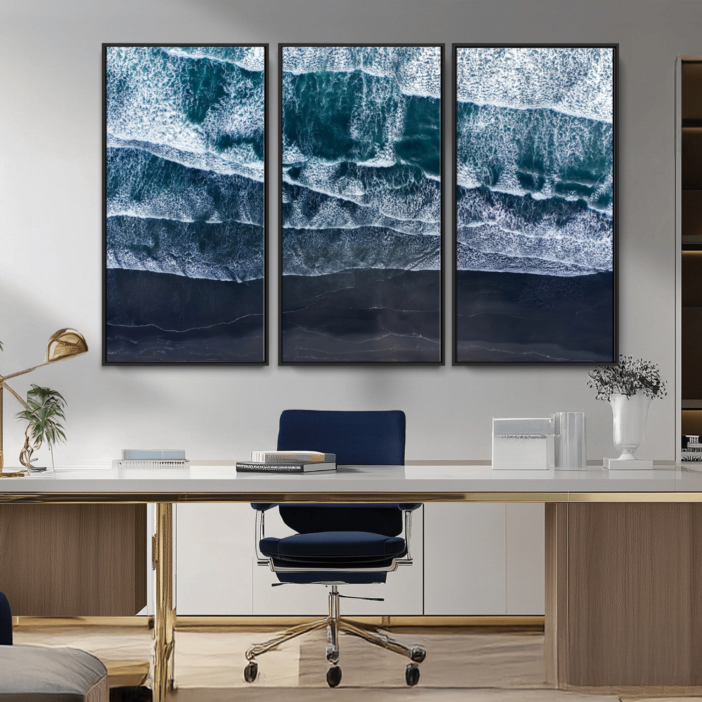 Canvas of aerial ocean waves crashing onto a black sand beach in moody tones, ideal for modern coastal or minimalist home decor.