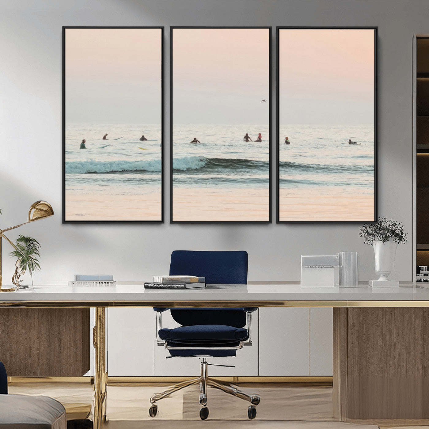 Dreamy photo of surfers waiting on soft pastel waves under a pink sunset sky, ideal for soft coastal minimalist or serene ocean-themed home decor.