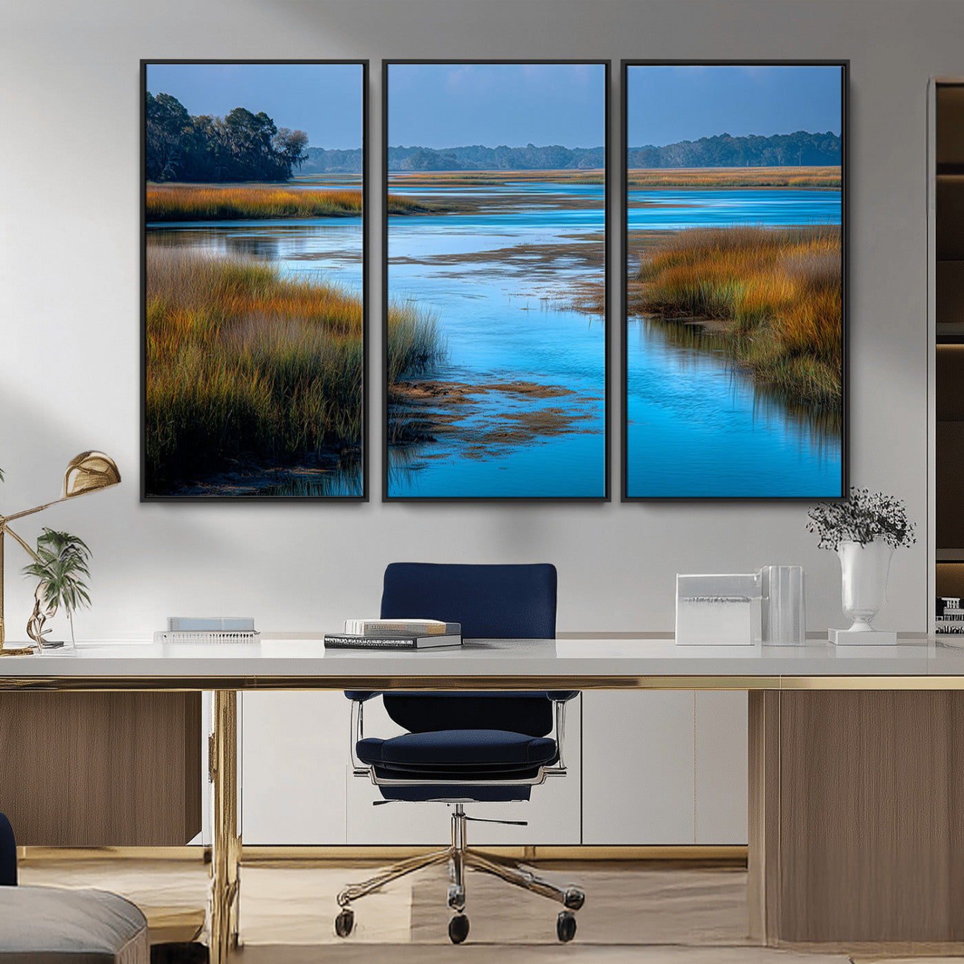 A peaceful marshland scene with calm blue water reflecting the surrounding grasses and trees, capturing the beauty of nature in a serene landscape.