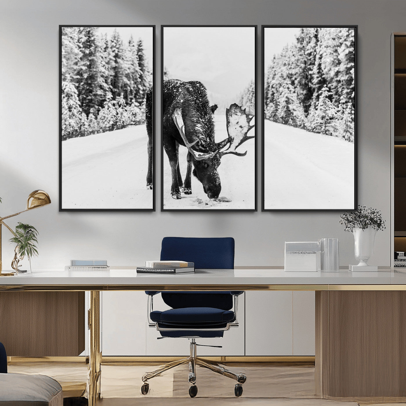 A majestic moose grazing in the snow-covered wilderness, surrounded by snow-covered trees, creating a peaceful winter scene.