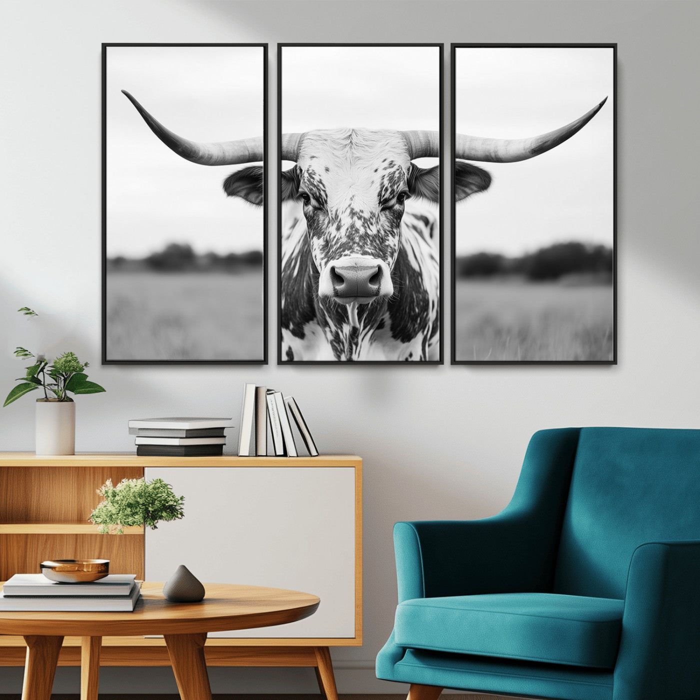Capture the strength and elegance of nature with this striking black and white portrait of a longhorn cow. Its powerful presence makes a bold statement in any room.