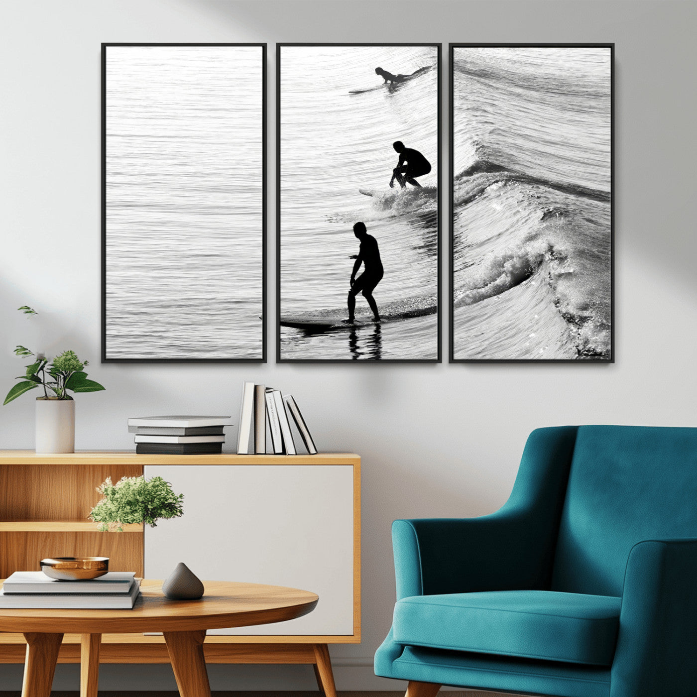 Black and white photo of surfers riding waves in a moody, high-contrast scene, ideal for modern coastal or surf-inspired home decor.