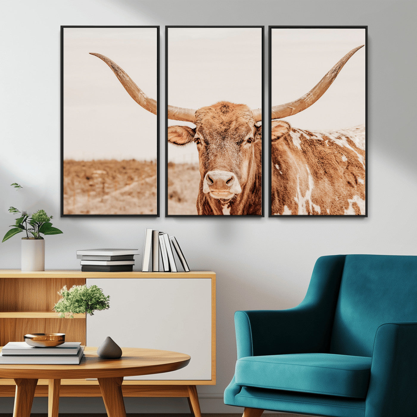 A longhorn bull standing proudly in a sunlit desert field with warm neutral tones, ideal for rustic western or farmhouse interiors.