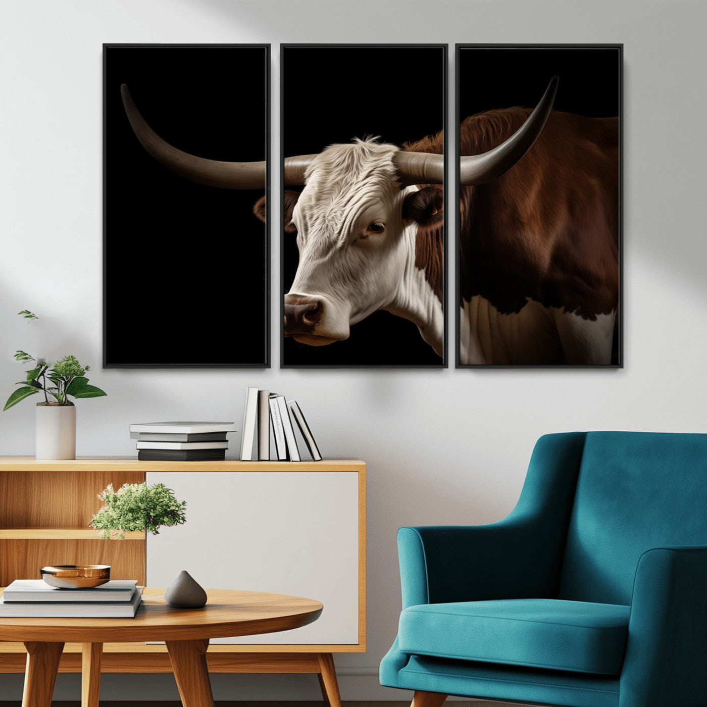 "Close-up of a brown and white longhorn cow with prominent curved horns against a black background."