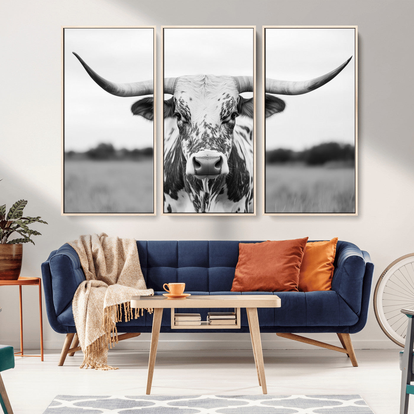 Capture the strength and elegance of nature with this striking black and white portrait of a longhorn cow. Its powerful presence makes a bold statement in any room.