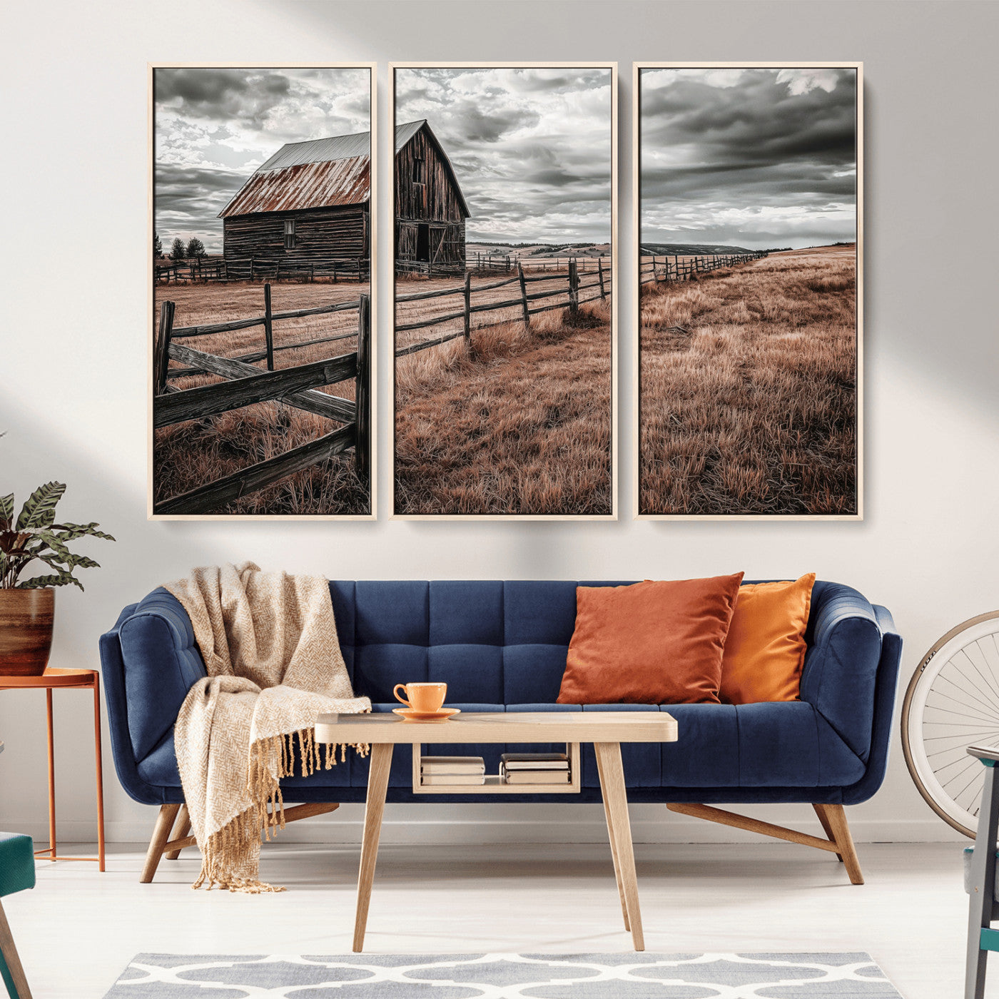 Framed canvas of a rustic barn under a moody sky with weathered fence and dark fields, ideal for farmhouse or rural-style wall decor.