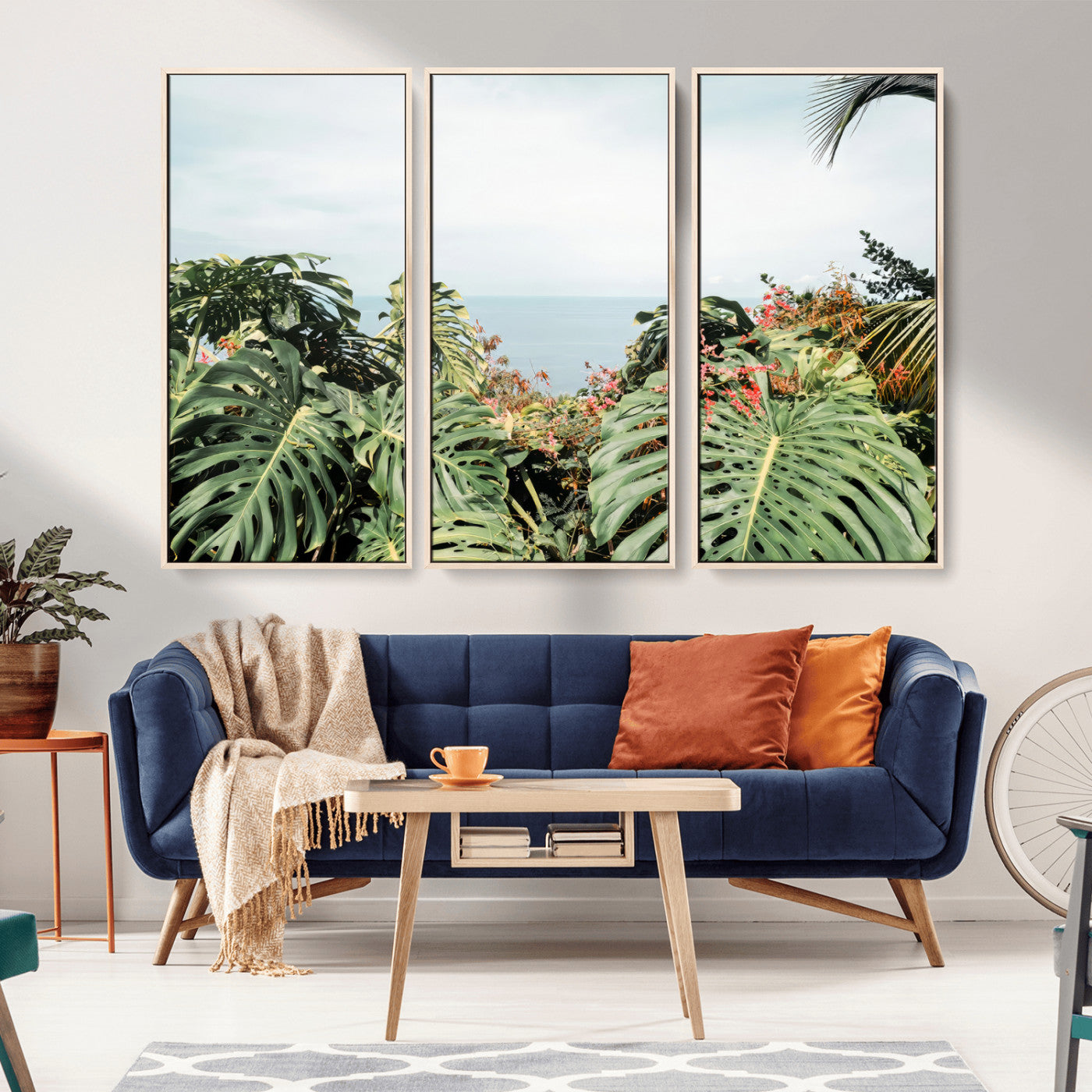 Monstera leaves and tropical flowers framing a calm ocean view, ideal for tropical coastal or exotic jungle-style interior wall decor.