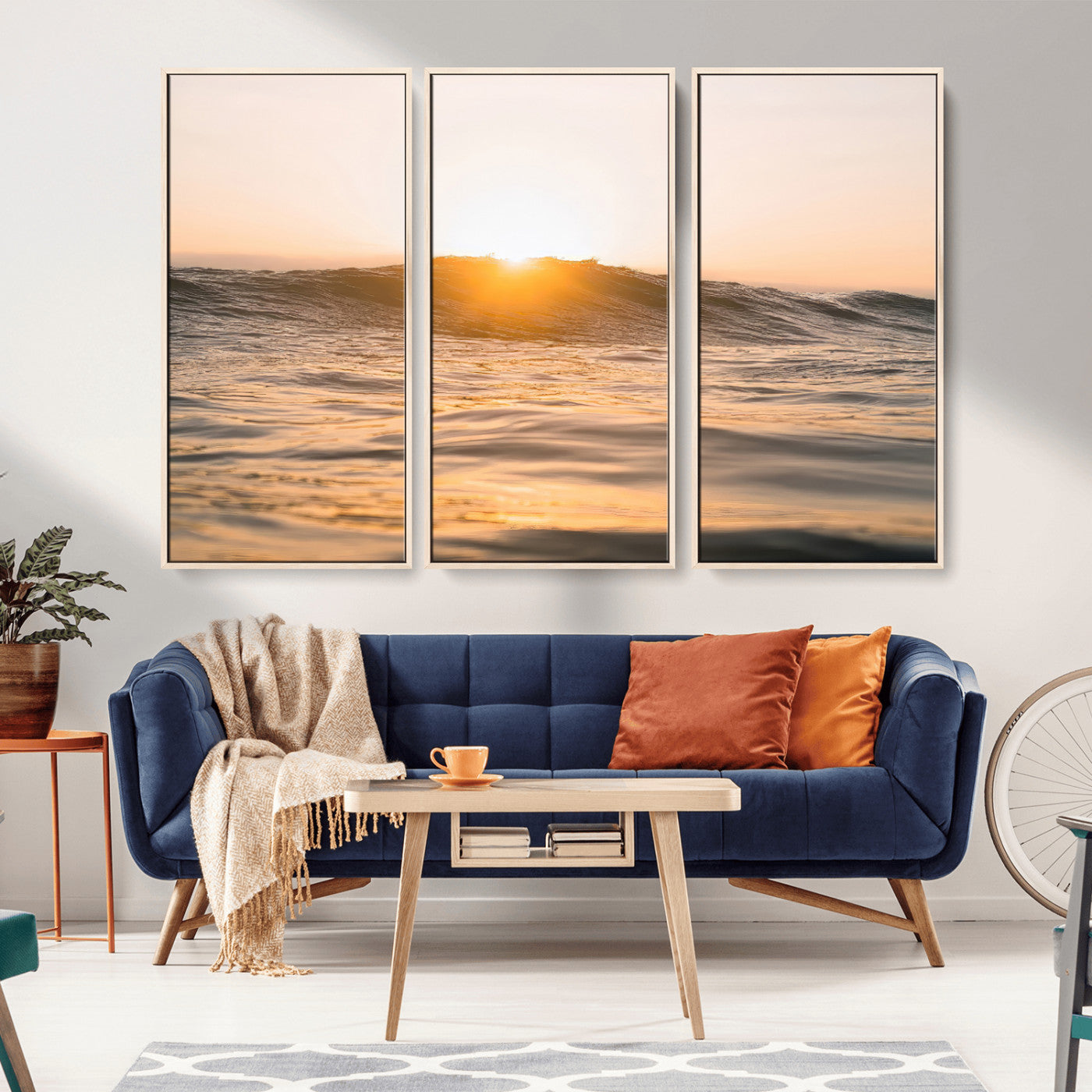 Ocean waves glowing under a warm golden sunset, reflecting soft light and calm movement, perfect for warm minimalist coastal interiors.