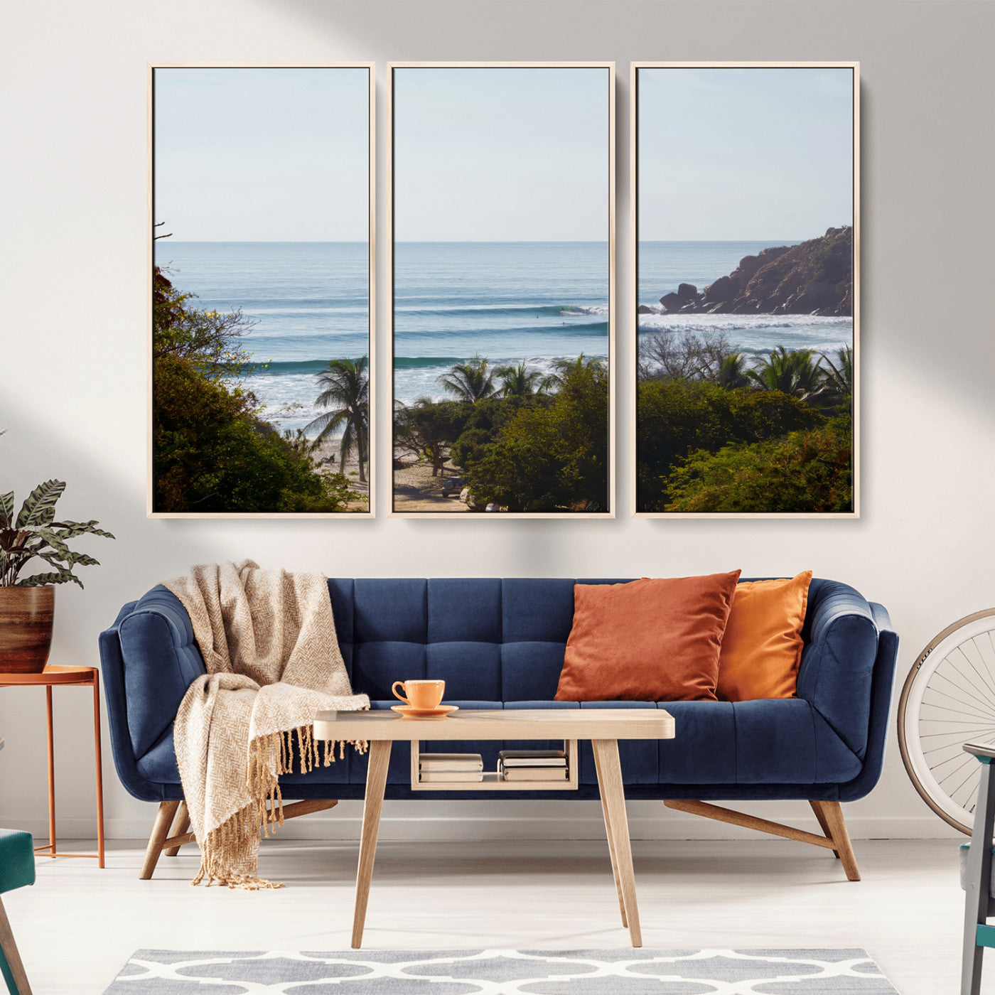View of calm ocean waves with palm trees and a tropical coastline, ideal for coastal boho or beach-themed wall decor.