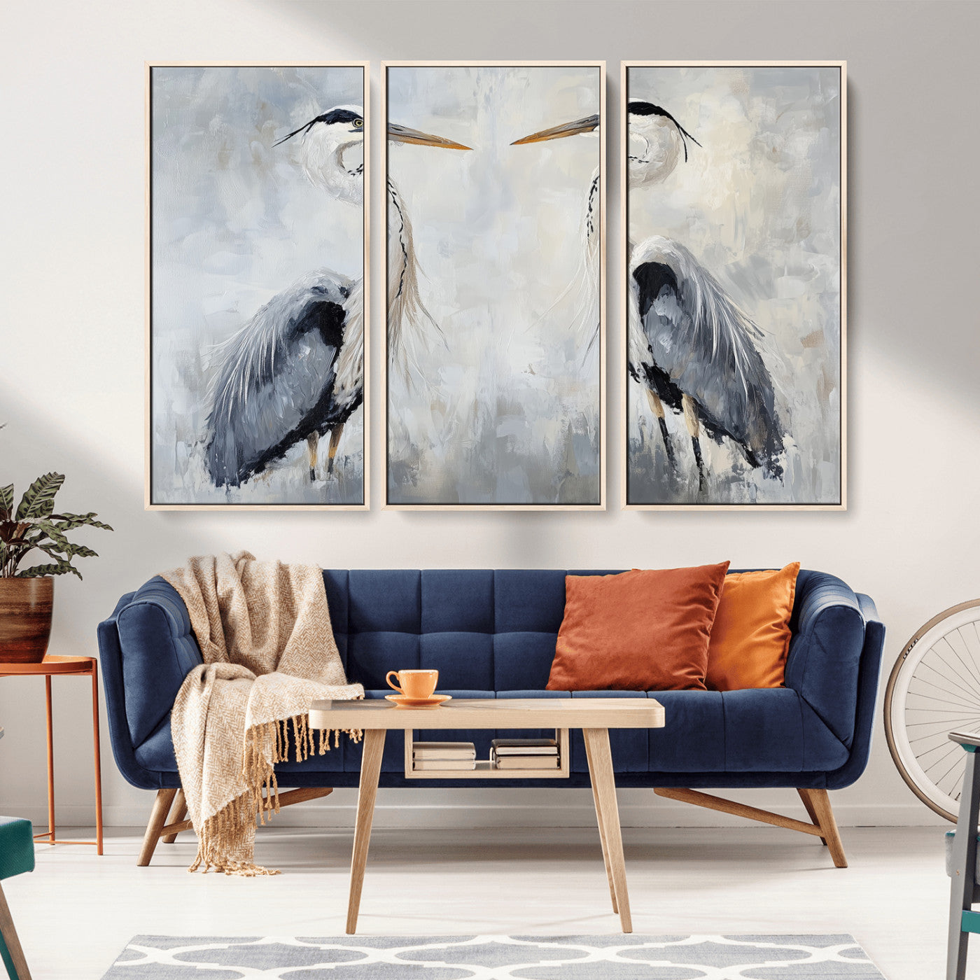 Two herons facing each other on a soft-toned background with blue-grey feathers, perfect for tranquil, coastal or nature-themed interiors.