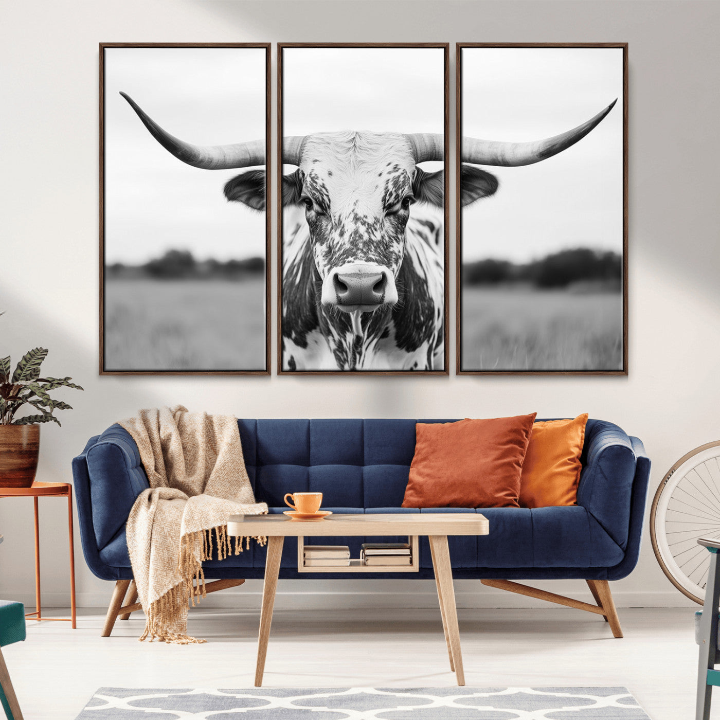 Capture the strength and elegance of nature with this striking black and white portrait of a longhorn cow. Its powerful presence makes a bold statement in any room.
