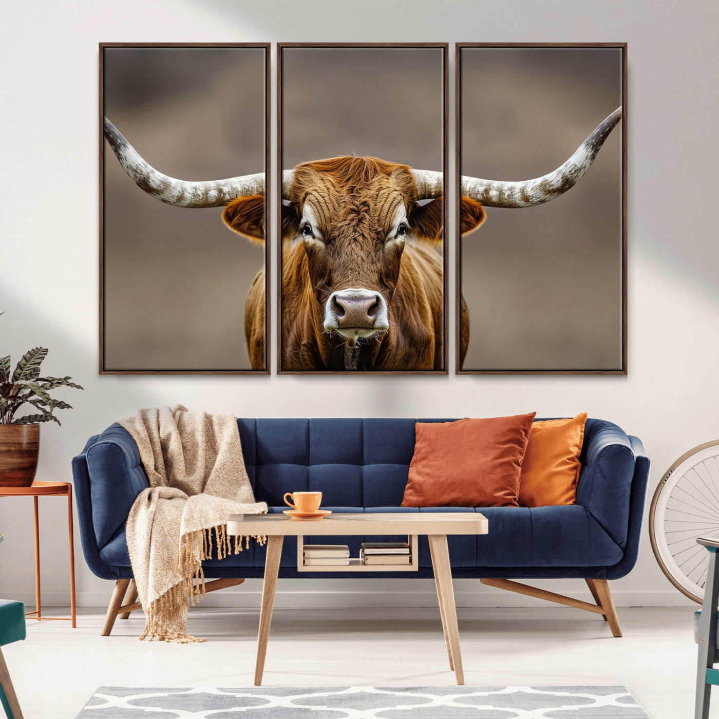 Close-up of a Texas Longhorn with strong curved horns and warm brown tones, perfect for rustic or western-style wall decor.