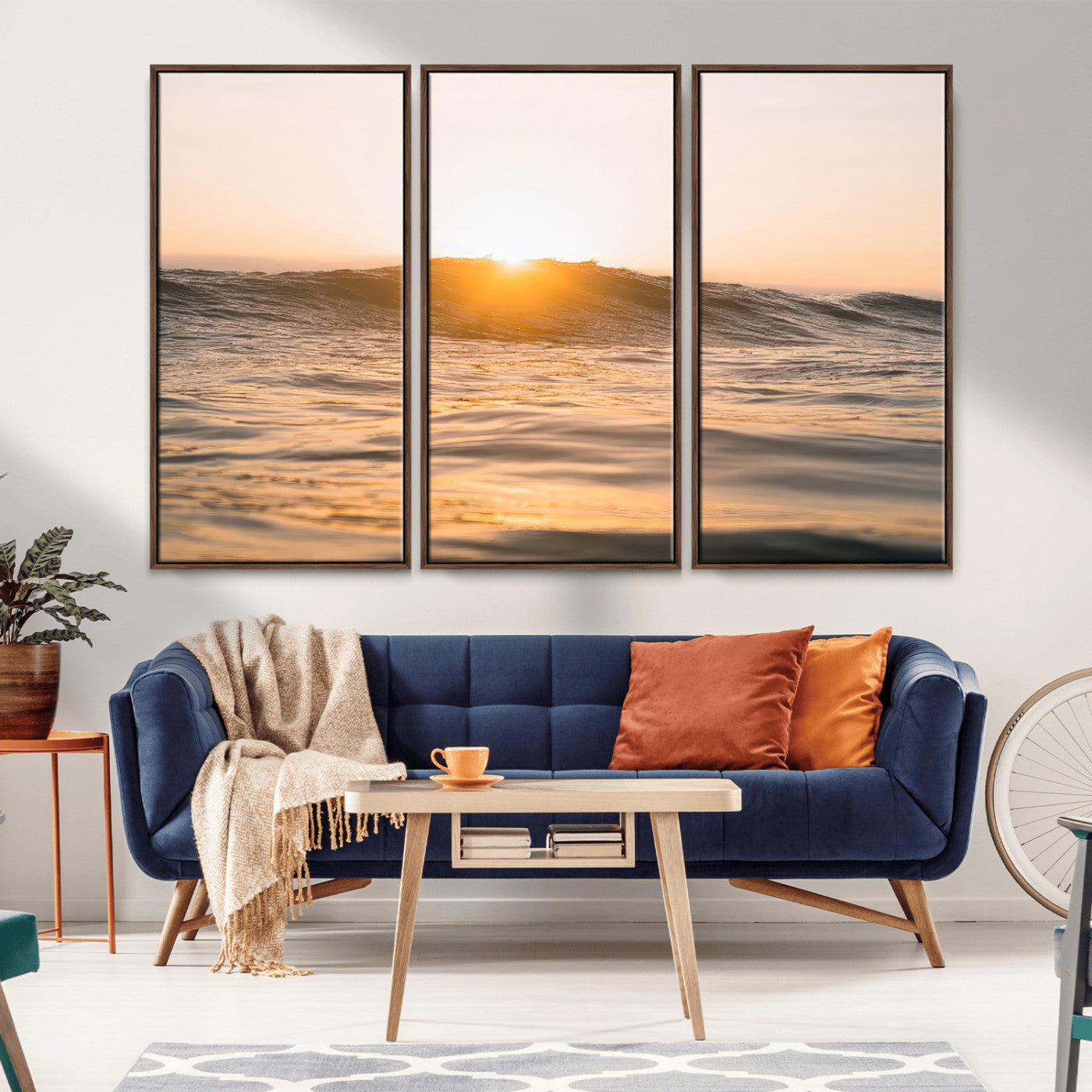 Ocean waves glowing under a warm golden sunset, reflecting soft light and calm movement, perfect for warm minimalist coastal interiors.