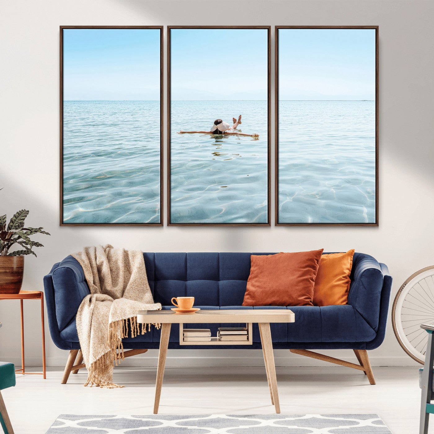 A peaceful minimalist scene of a person floating on crystal-clear water, surrounded by a vast open horizon, capturing relaxation and serenity in a tranquil aquatic setting.