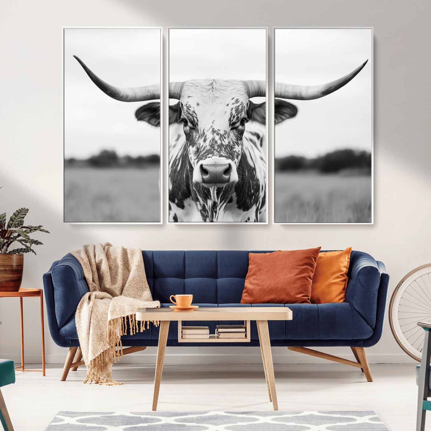 Capture the strength and elegance of nature with this striking black and white portrait of a longhorn cow. Its powerful presence makes a bold statement in any room.