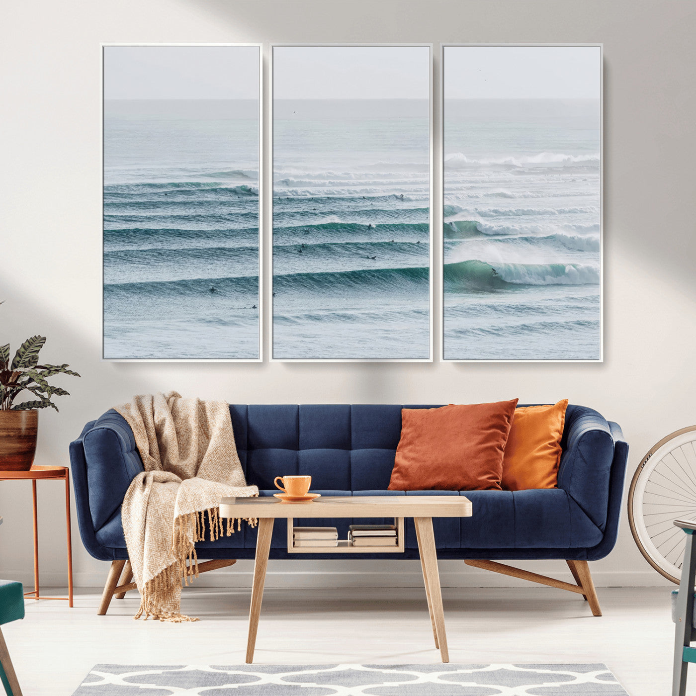 High-angle view of surfers lining up across layered ocean waves, ideal for minimal coastal or surf-inspired room decor.