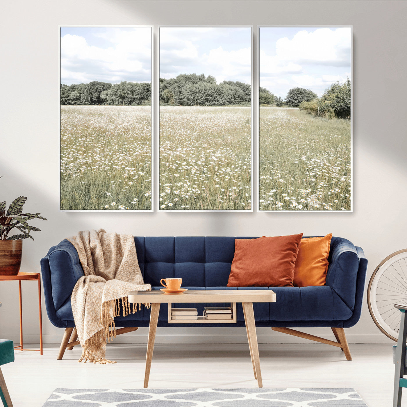 Soft-toned image of a wild daisy field under a cloudy sky, ideal for neutral or Scandinavian-inspired home decor.
