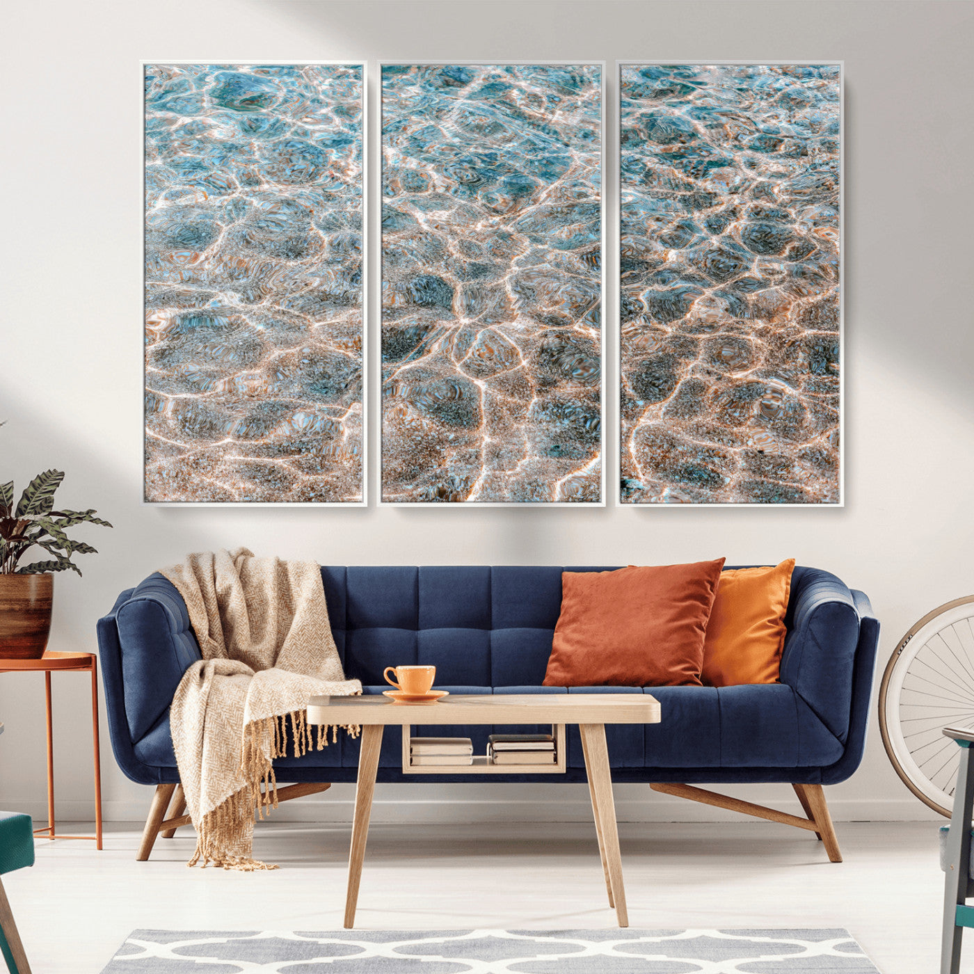 Close-up of sunlit ocean ripples with aqua blue and golden tones, ideal for modern coastal or minimalist home decor.