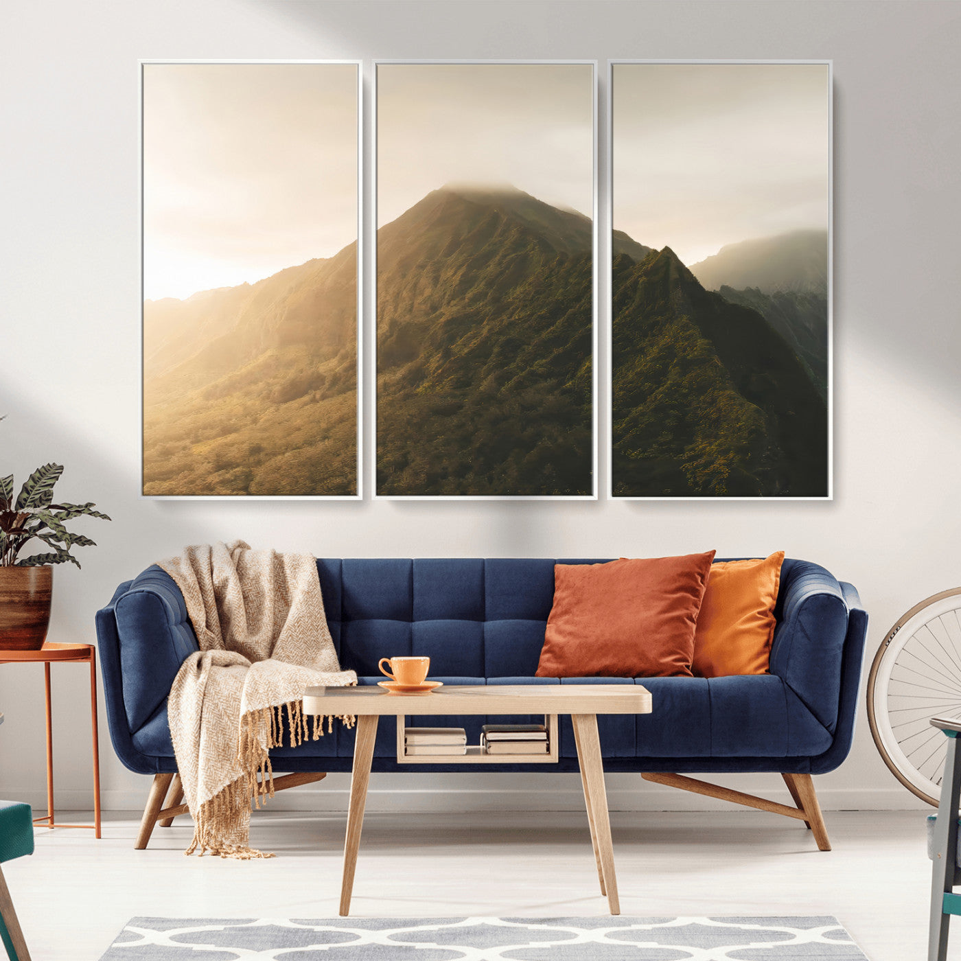 Sunlit mountain peak with mist rolling over its rugged slopes, bathed in golden light, creating a warm and tranquil nature-inspired scene.